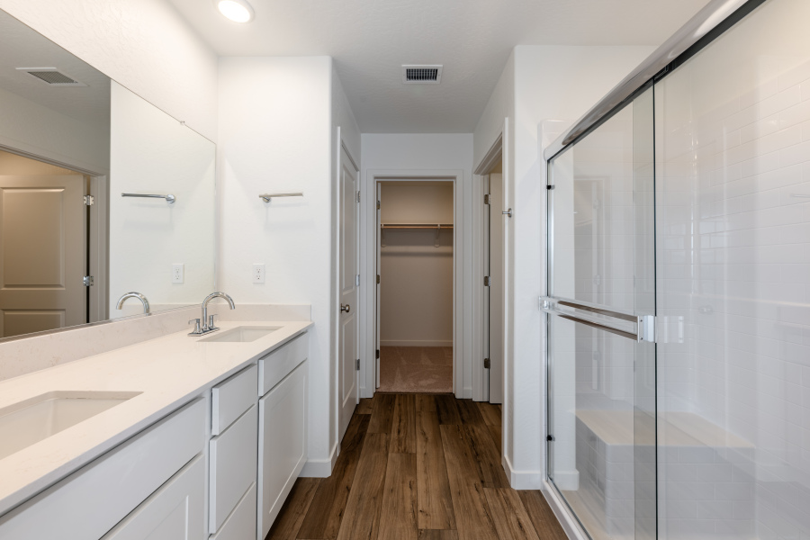 A bathroom with a glass shower.