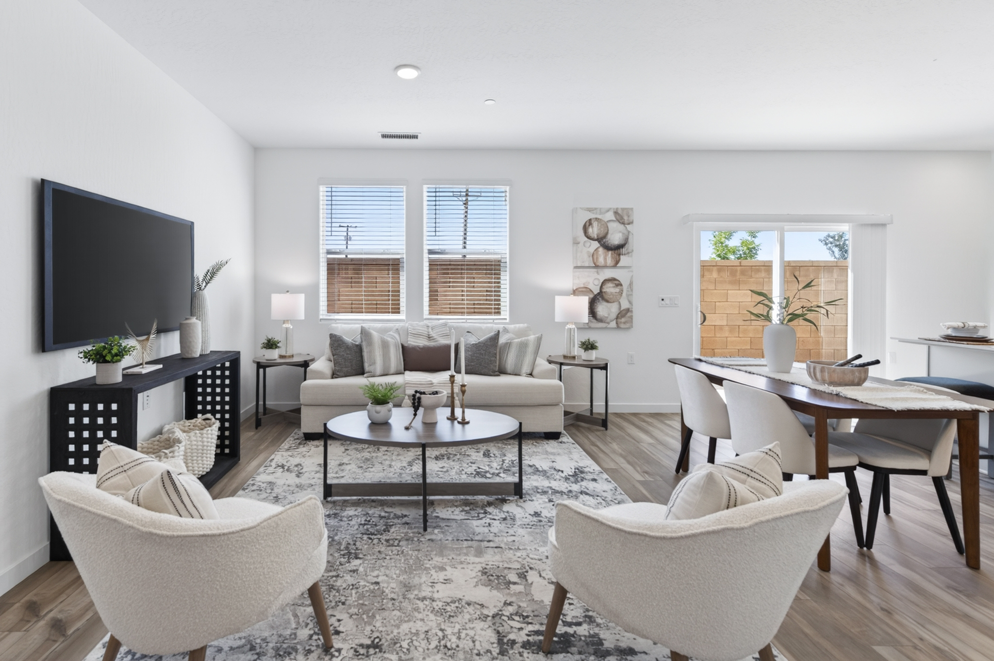 A living room with a large window.