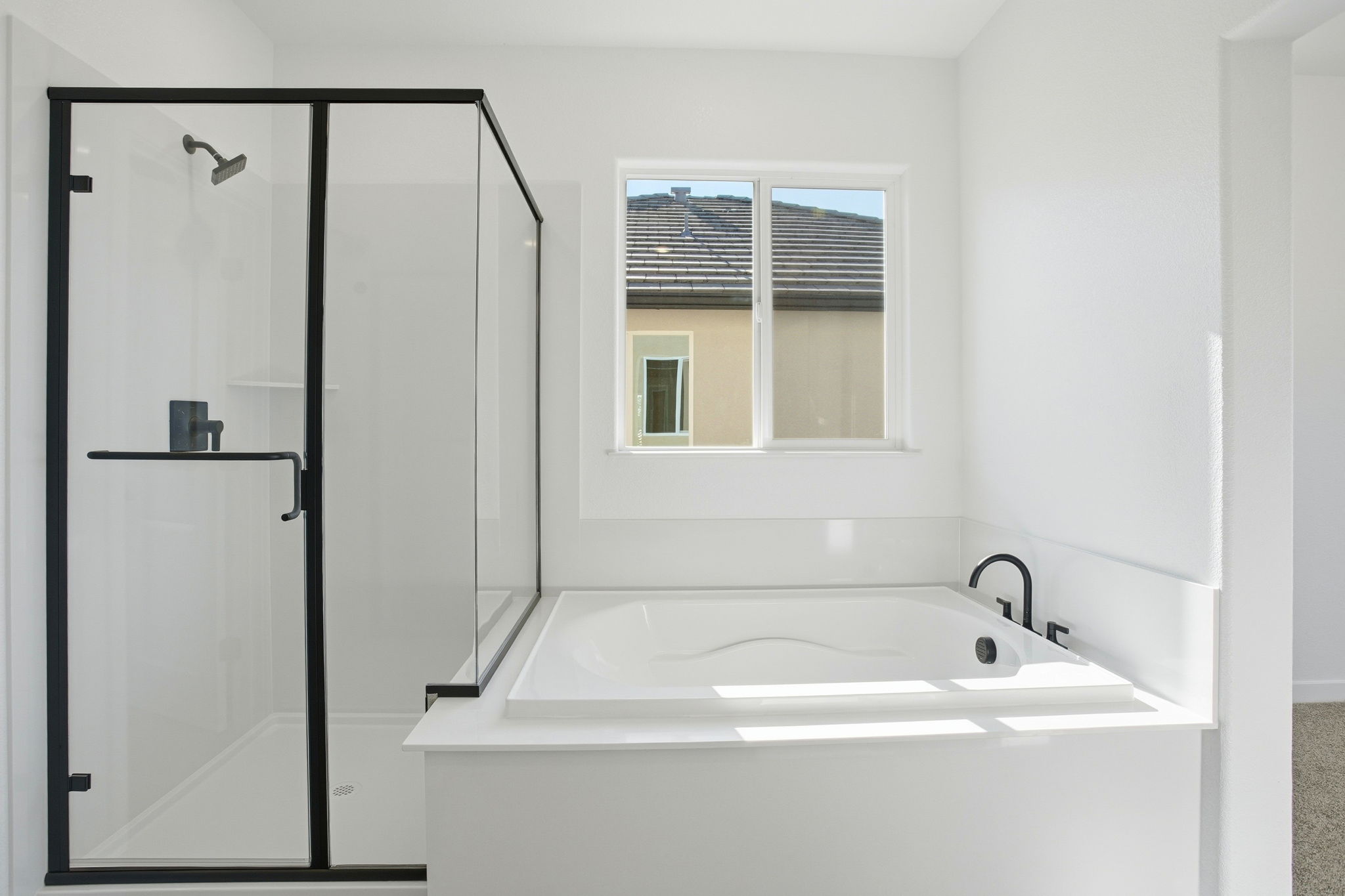 A bathroom with a glass shower.