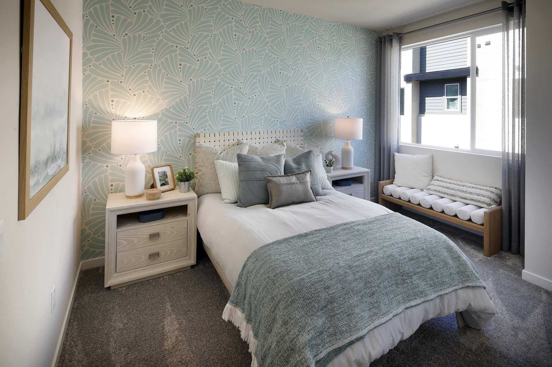 A bedroom with two beds.