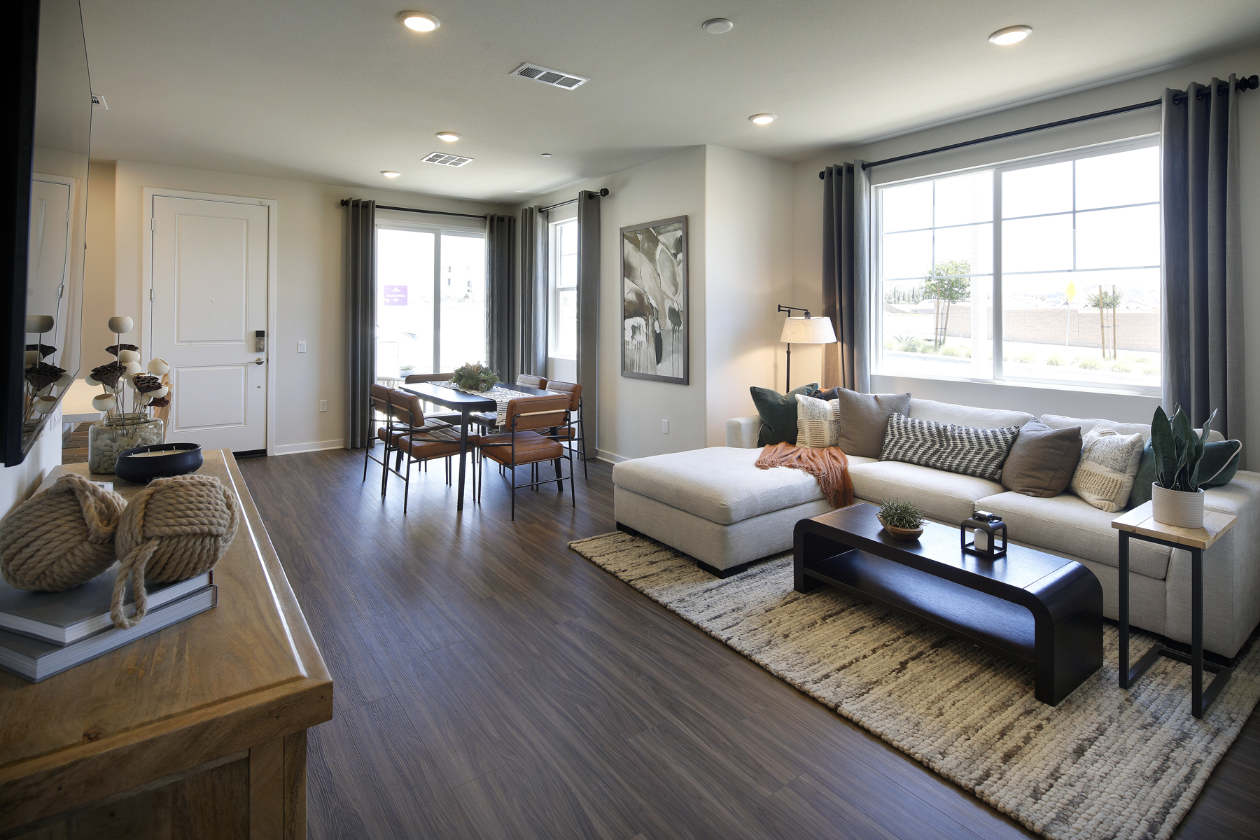 A living room with a large window.