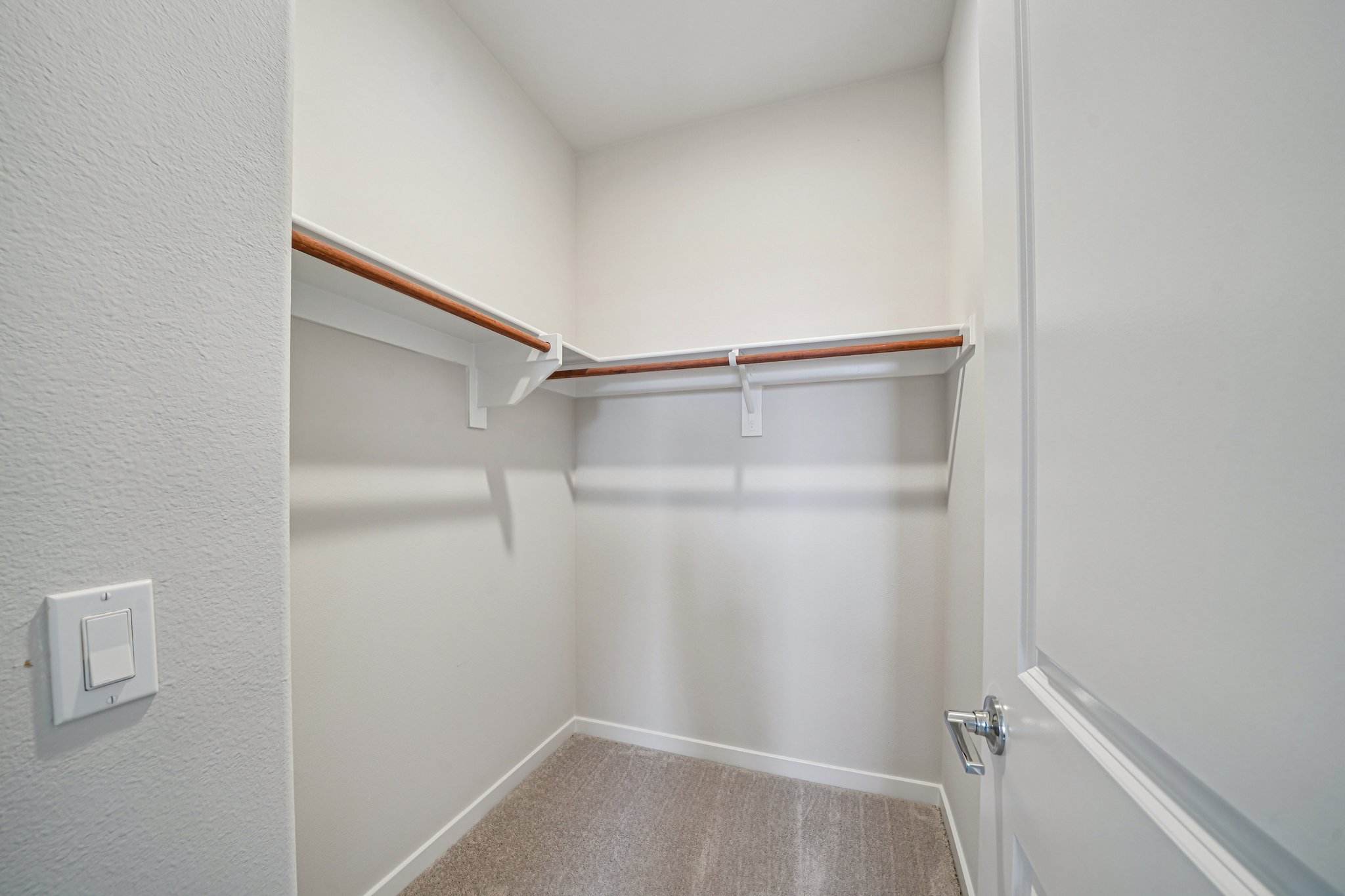 A white room with a white wall.