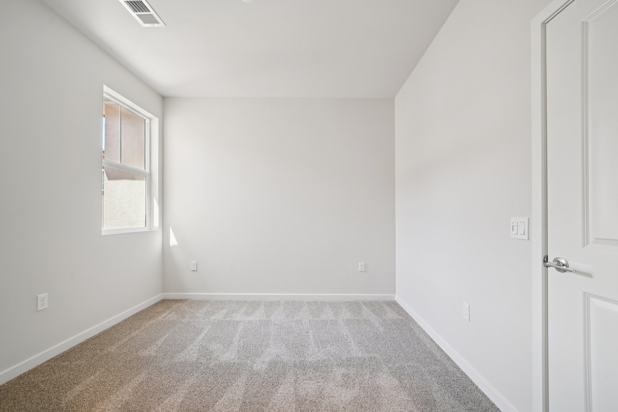 A room with white walls.