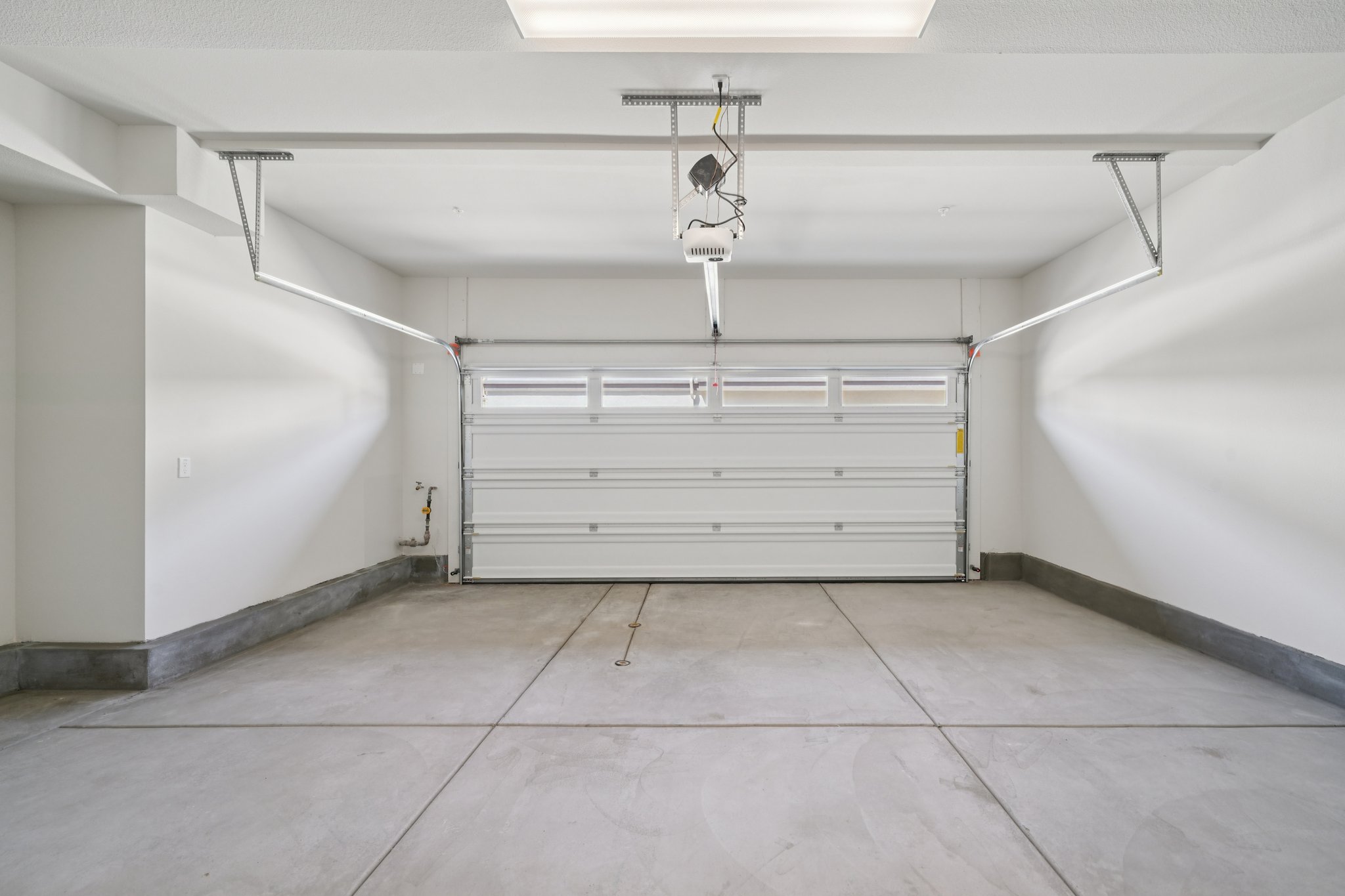 A white room with a white wall.