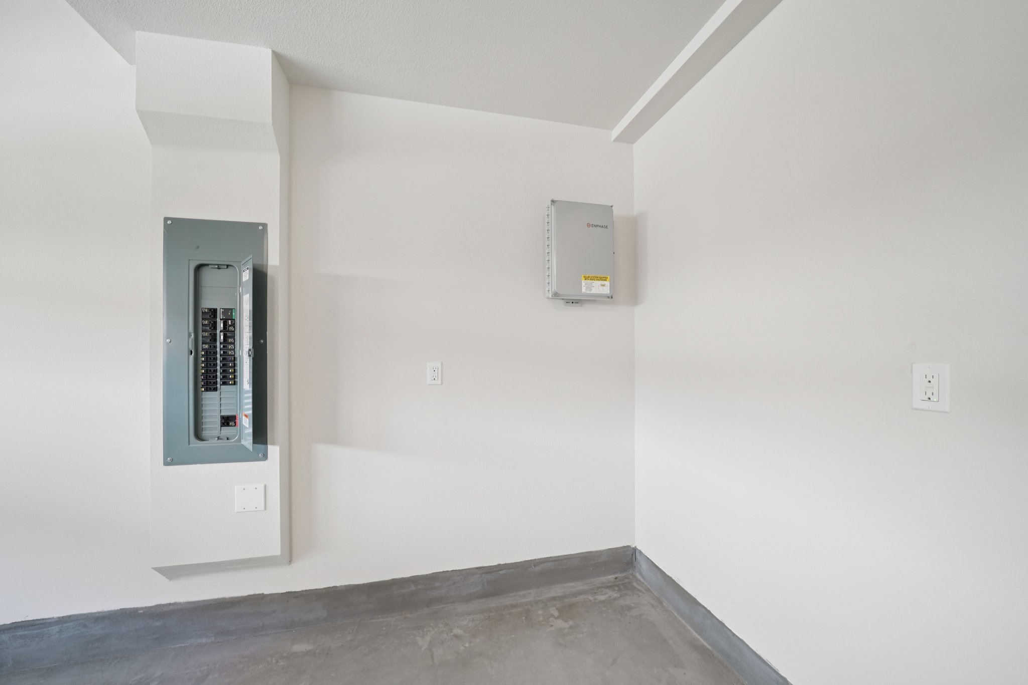 A room with a window and a door.