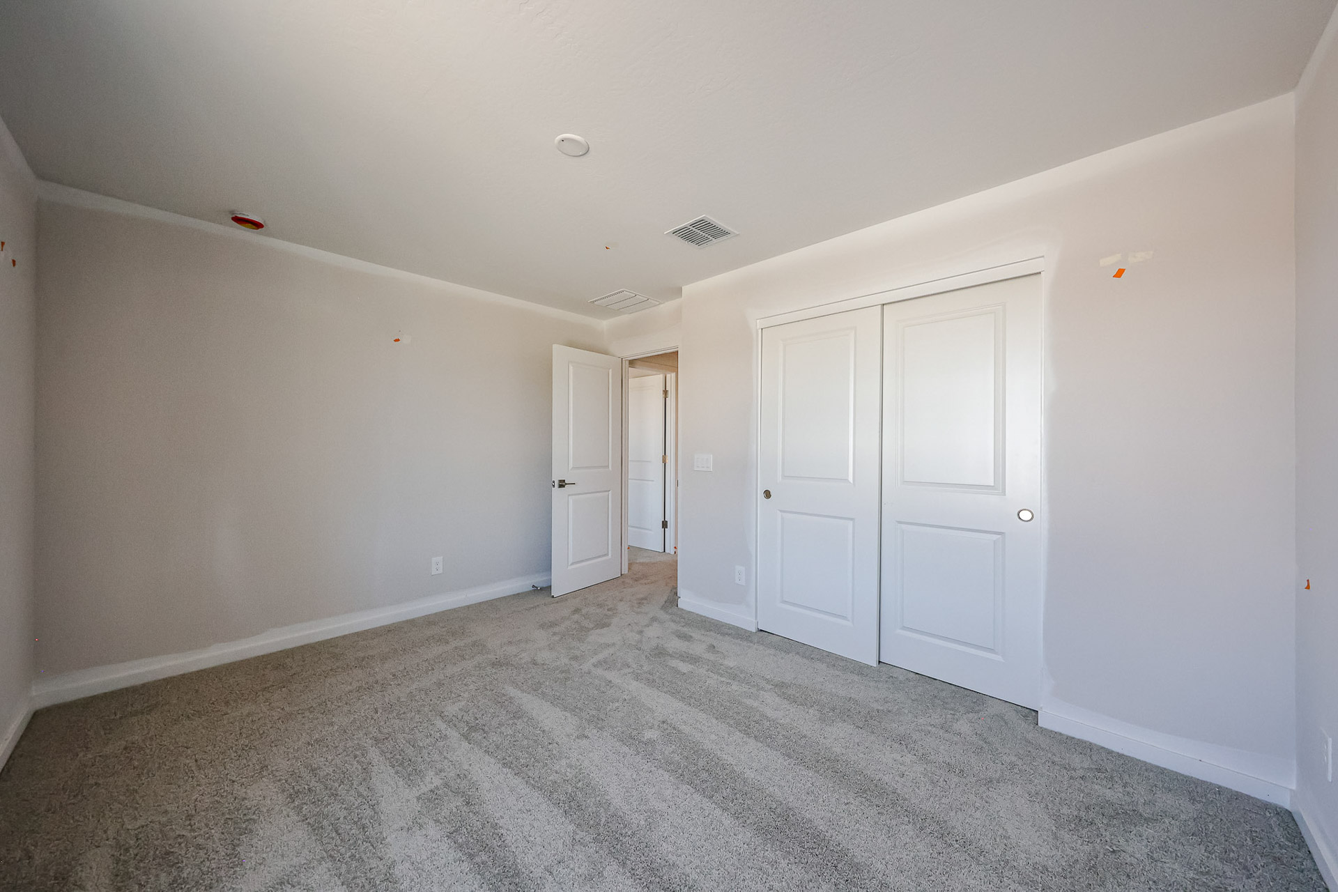 A room with white doors.