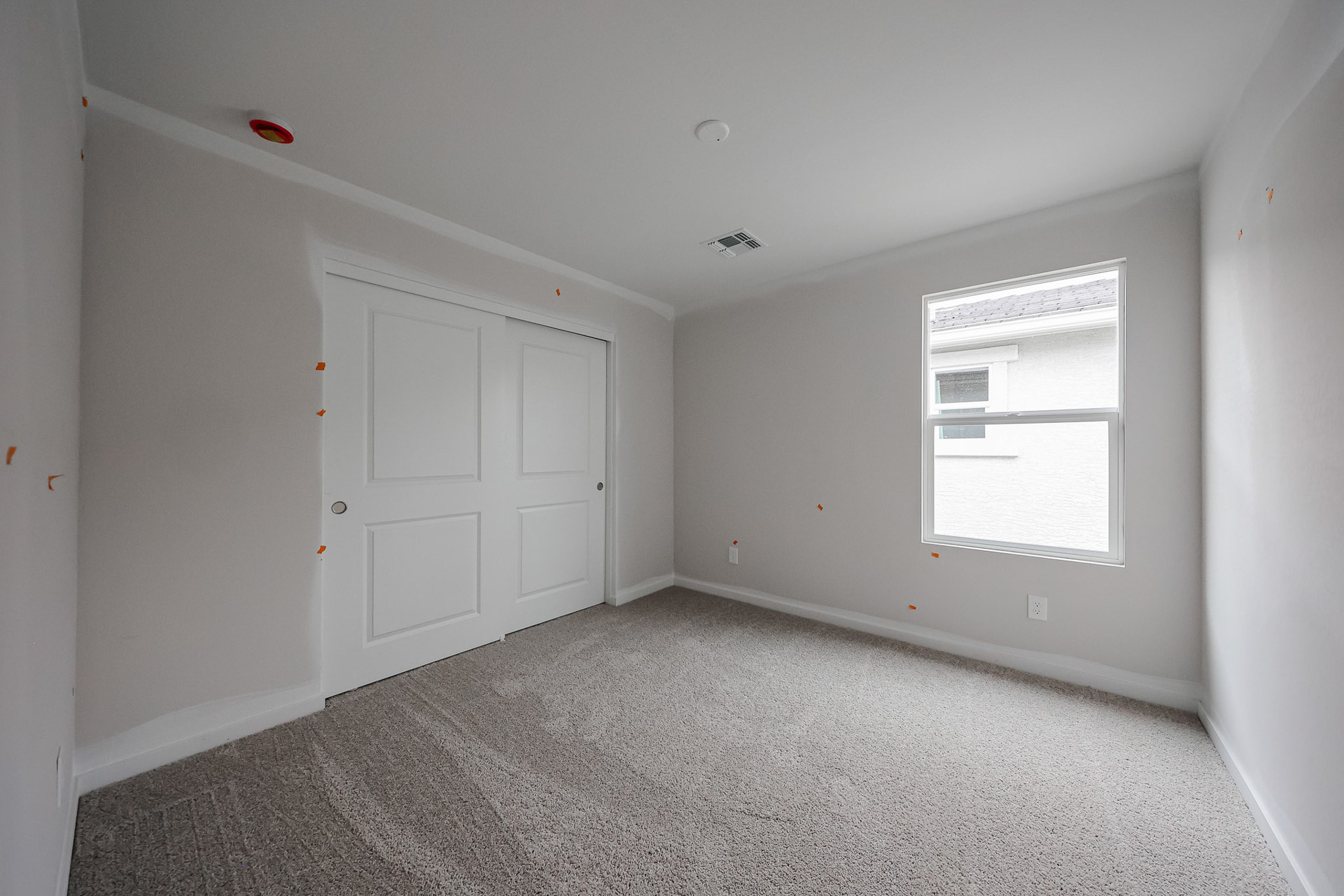 A room with white doors.