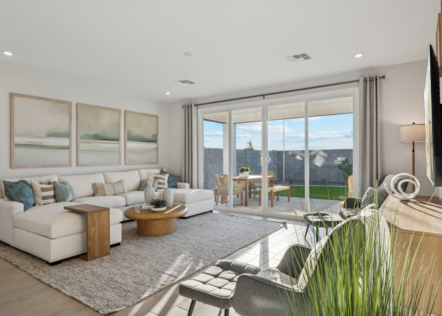 A living room with a large window.