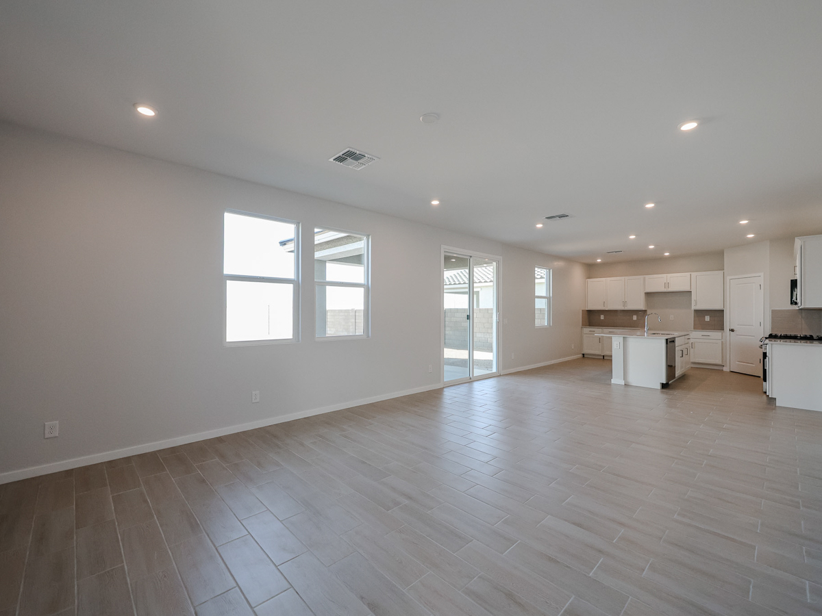 A large empty room with white walls.