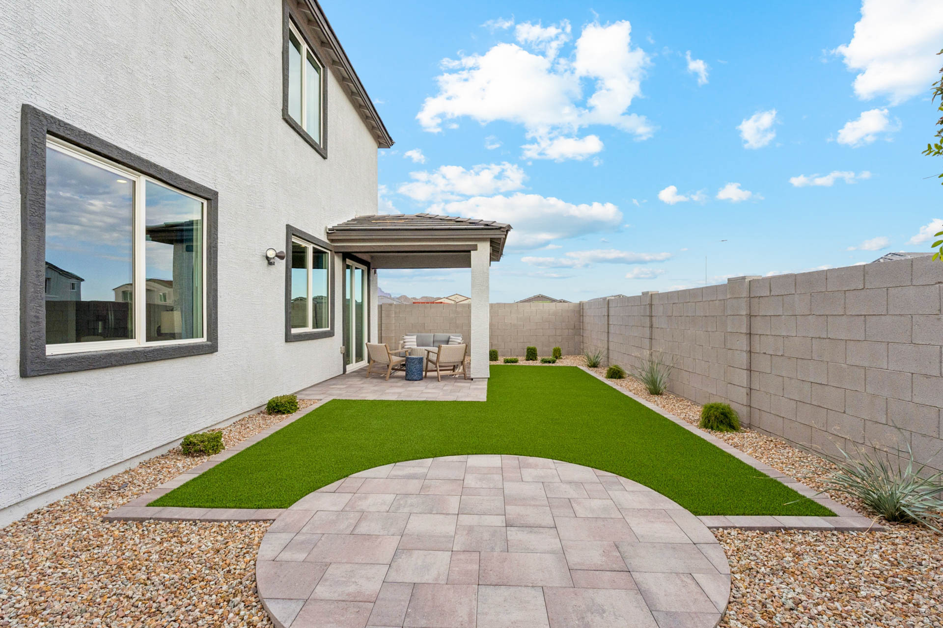 A house with a patio and a brick patio.