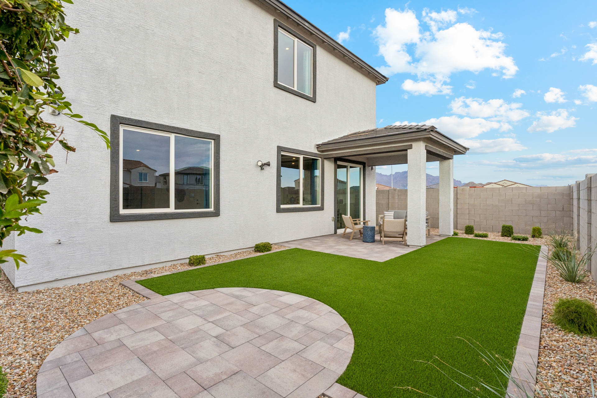 A house with a large front yard.