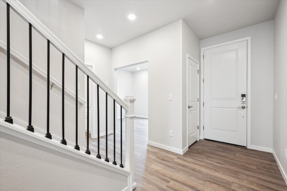 A white staircase in a house.