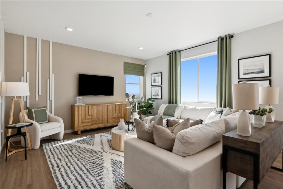 A living room with a large window.