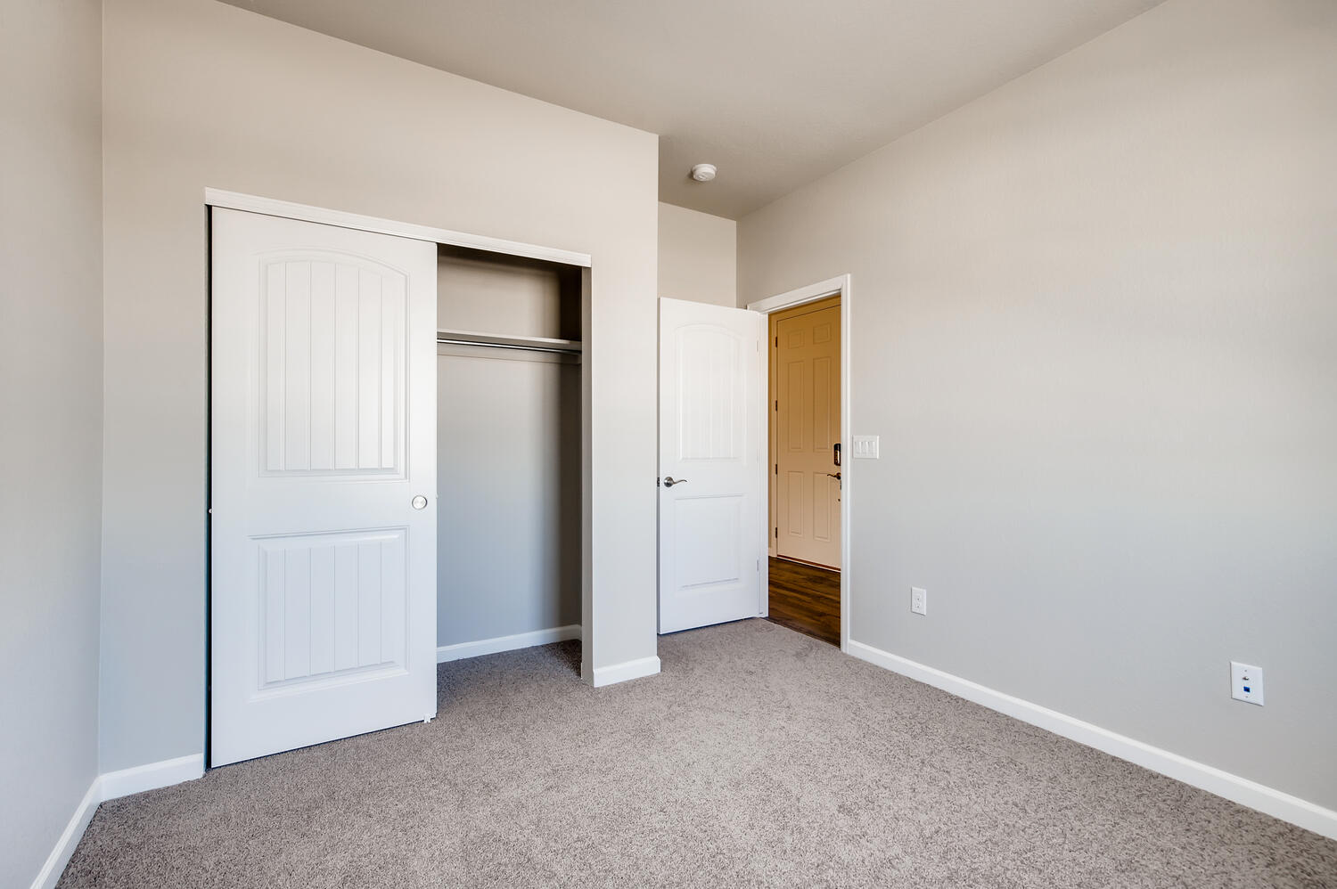 A room with white doors.