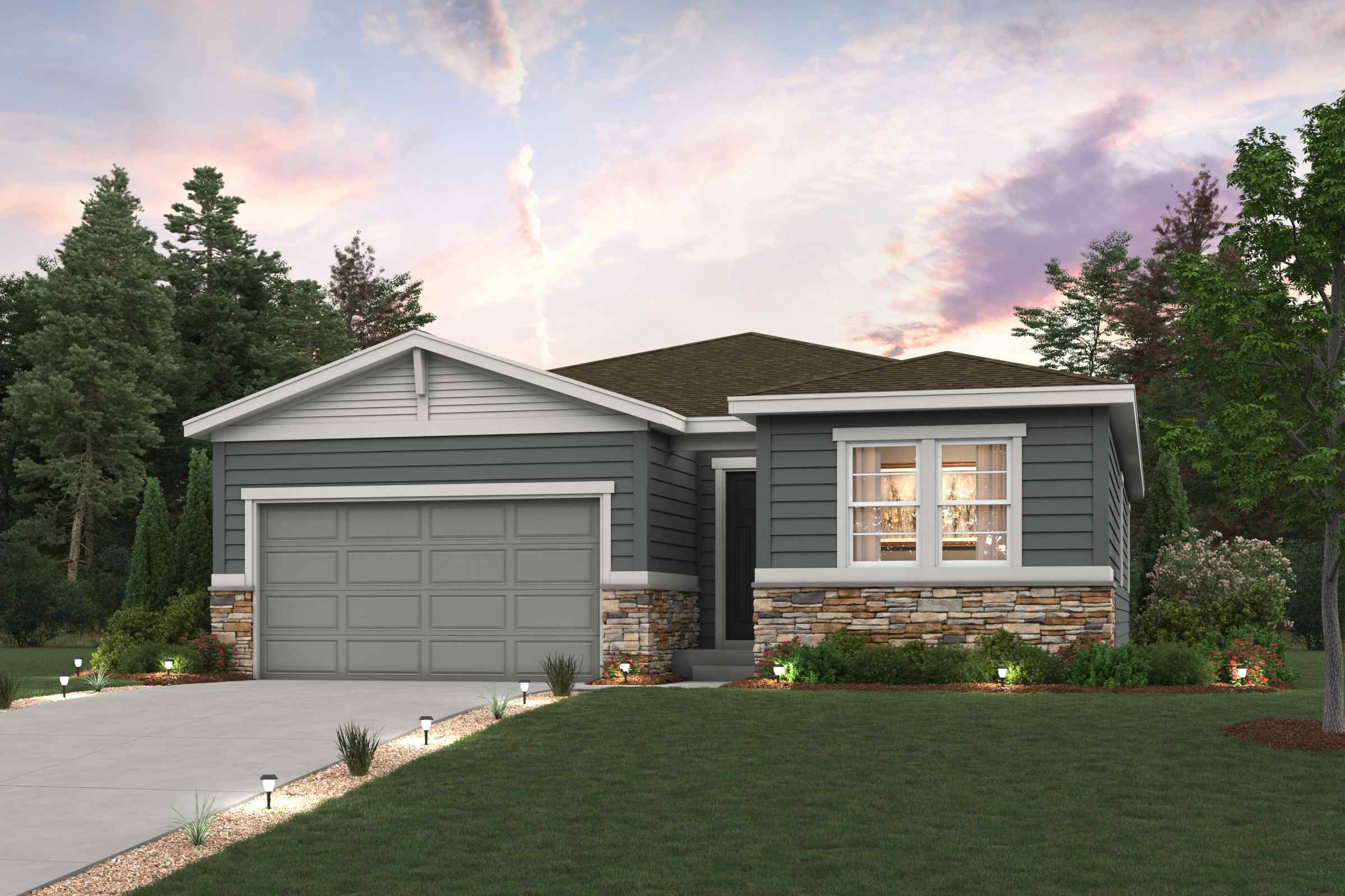 A house with a garage and a lawn in front of it.