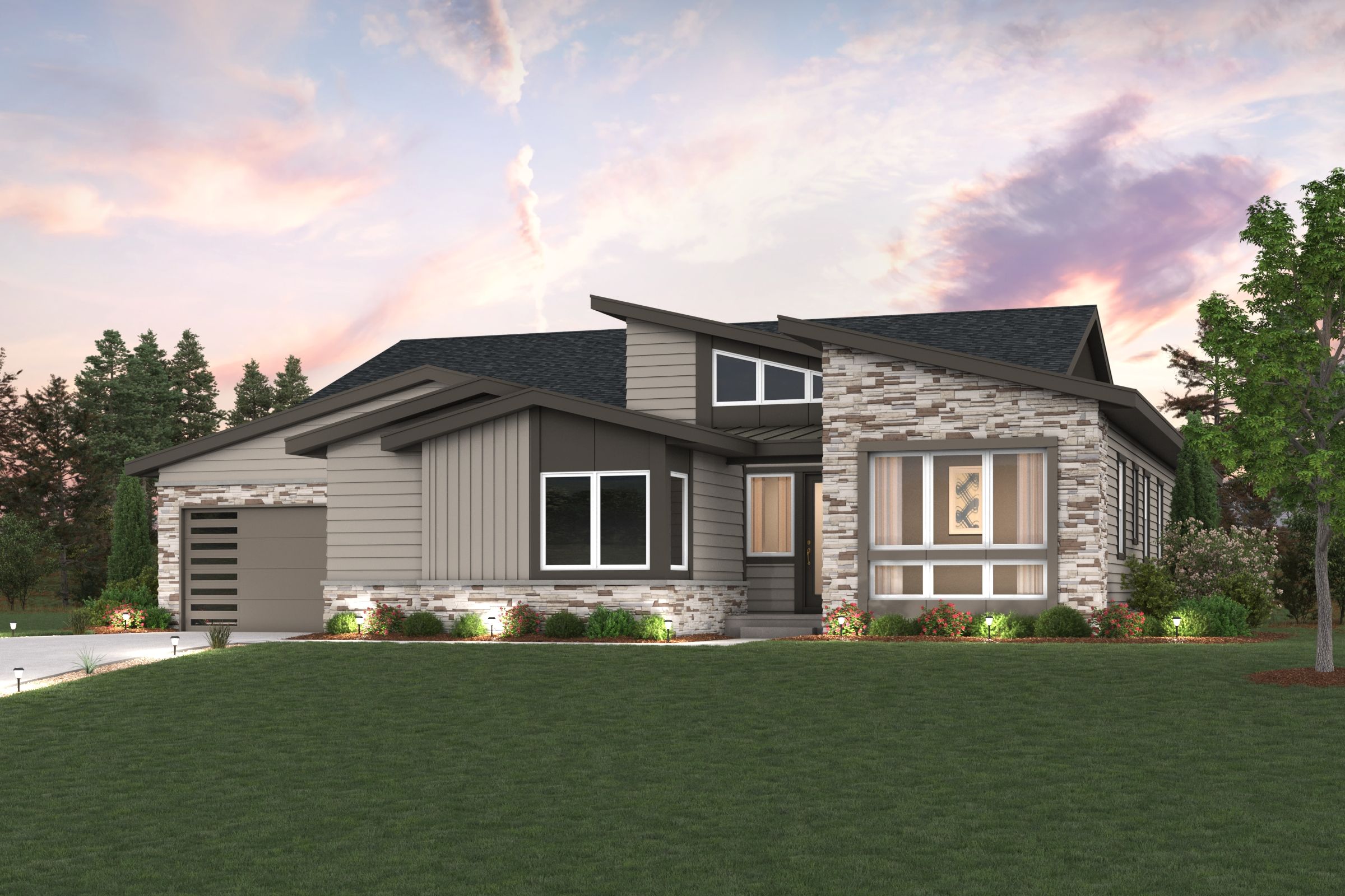 A house with a lawn in front of it.