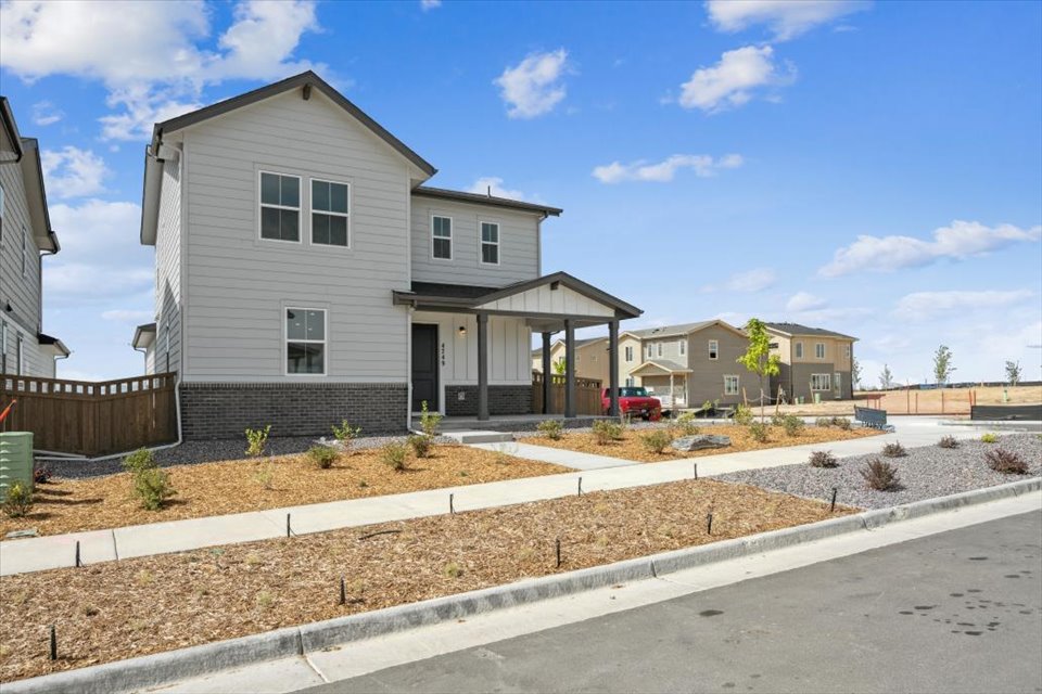 A road with houses along it.