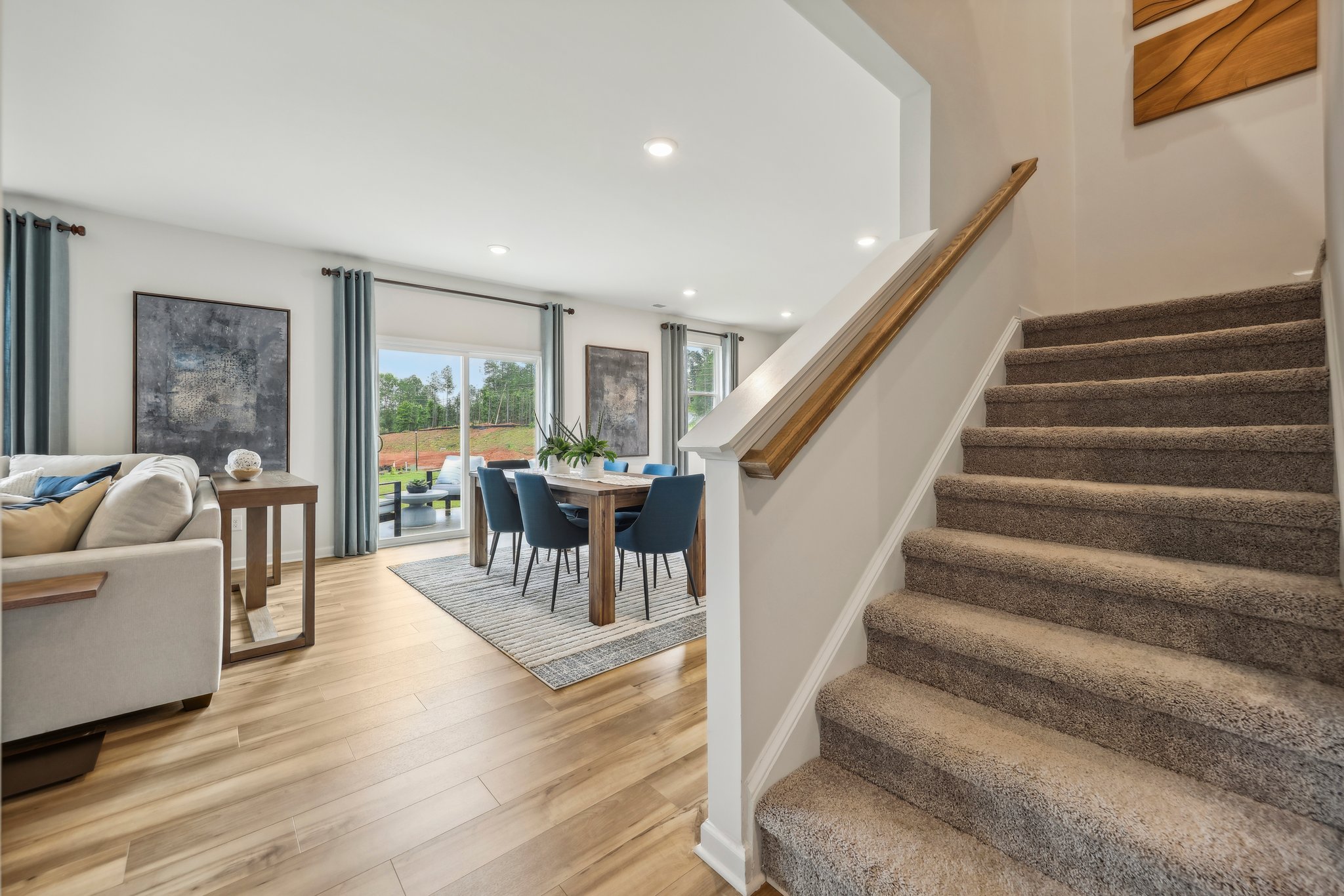 A staircase leading to a living room.
