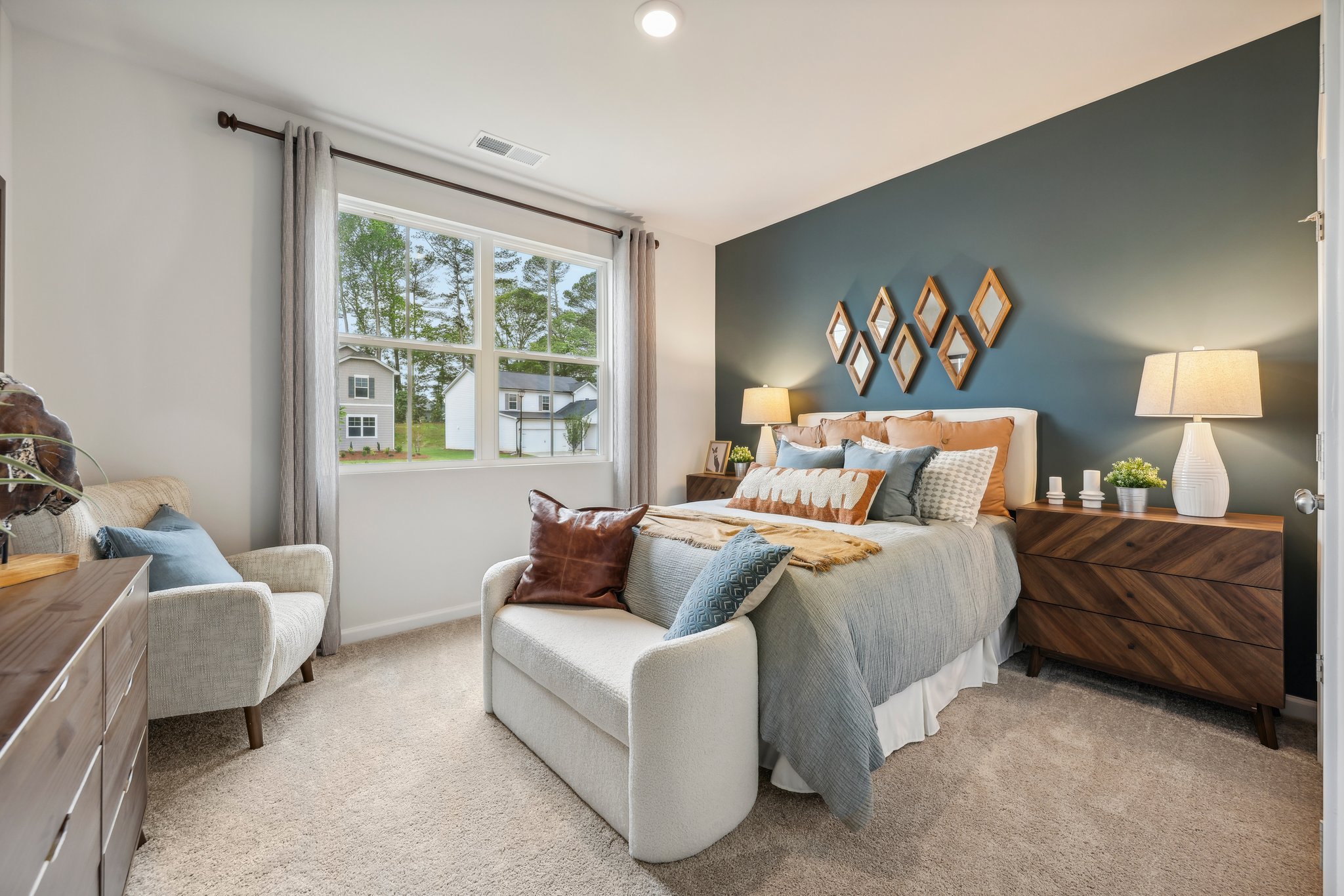 A living room with a couch and a table.