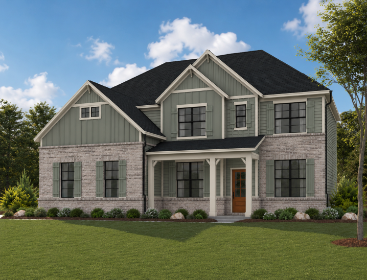 A house with a lawn in front.
