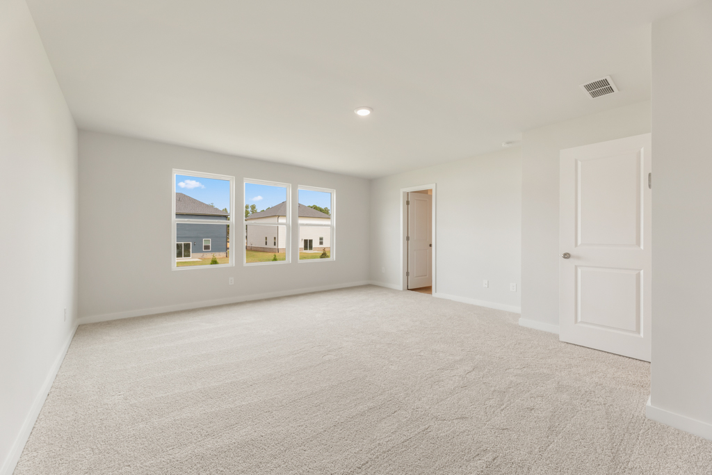 A room with white doors and windows.
