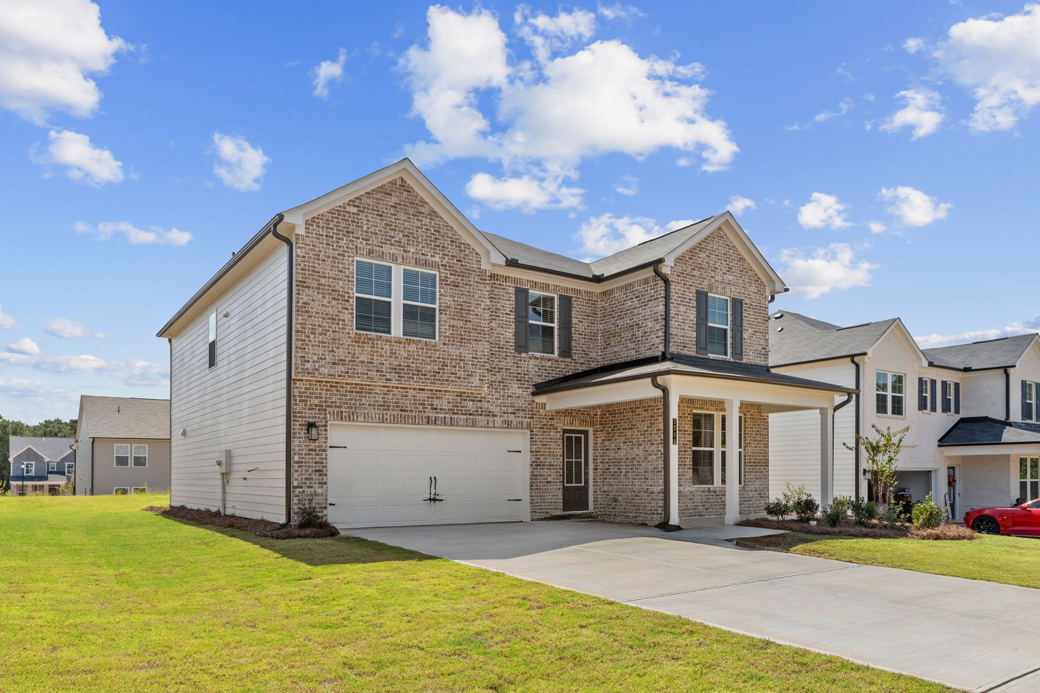 A large house with a garage.
