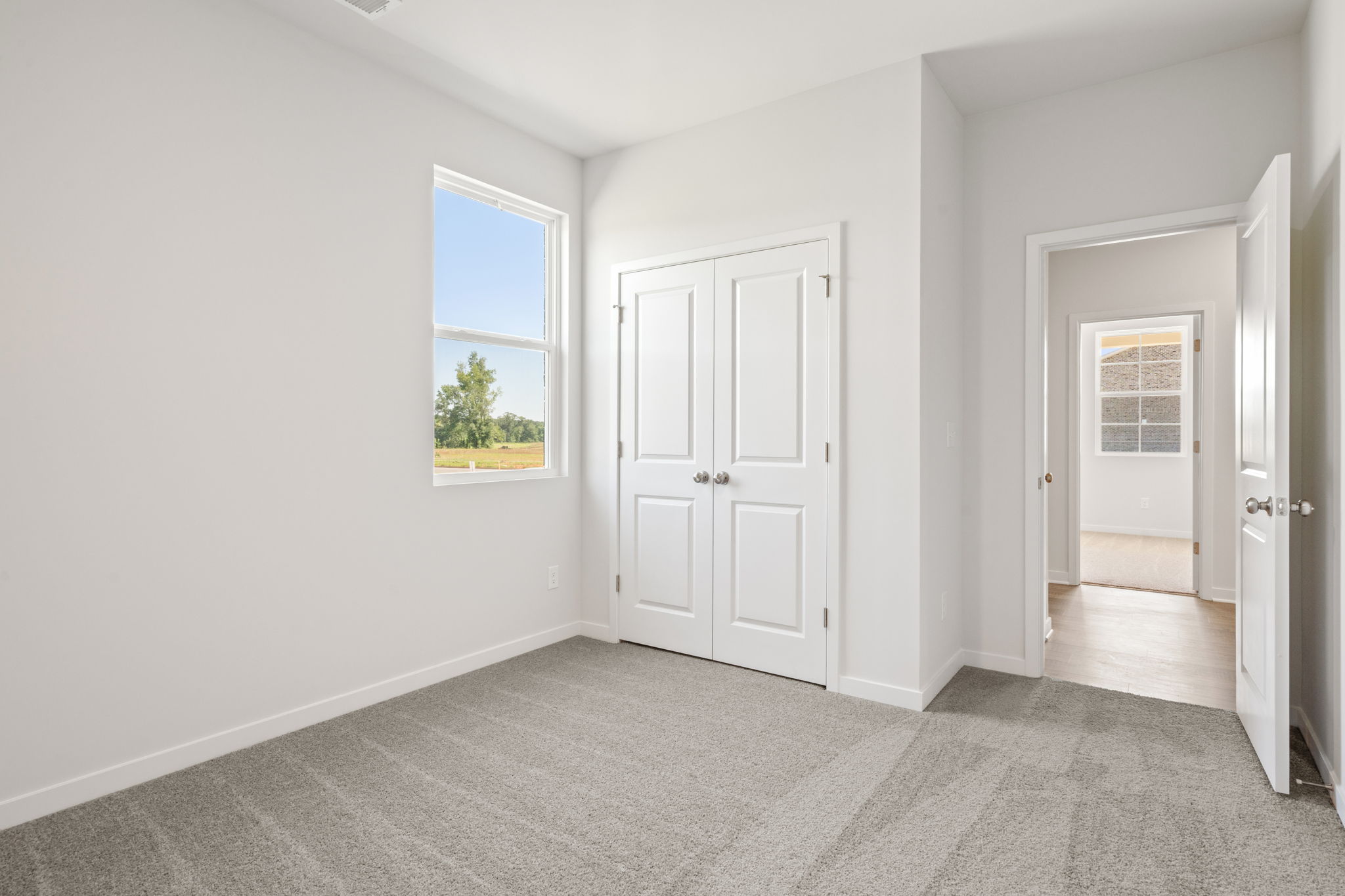A room with white doors.