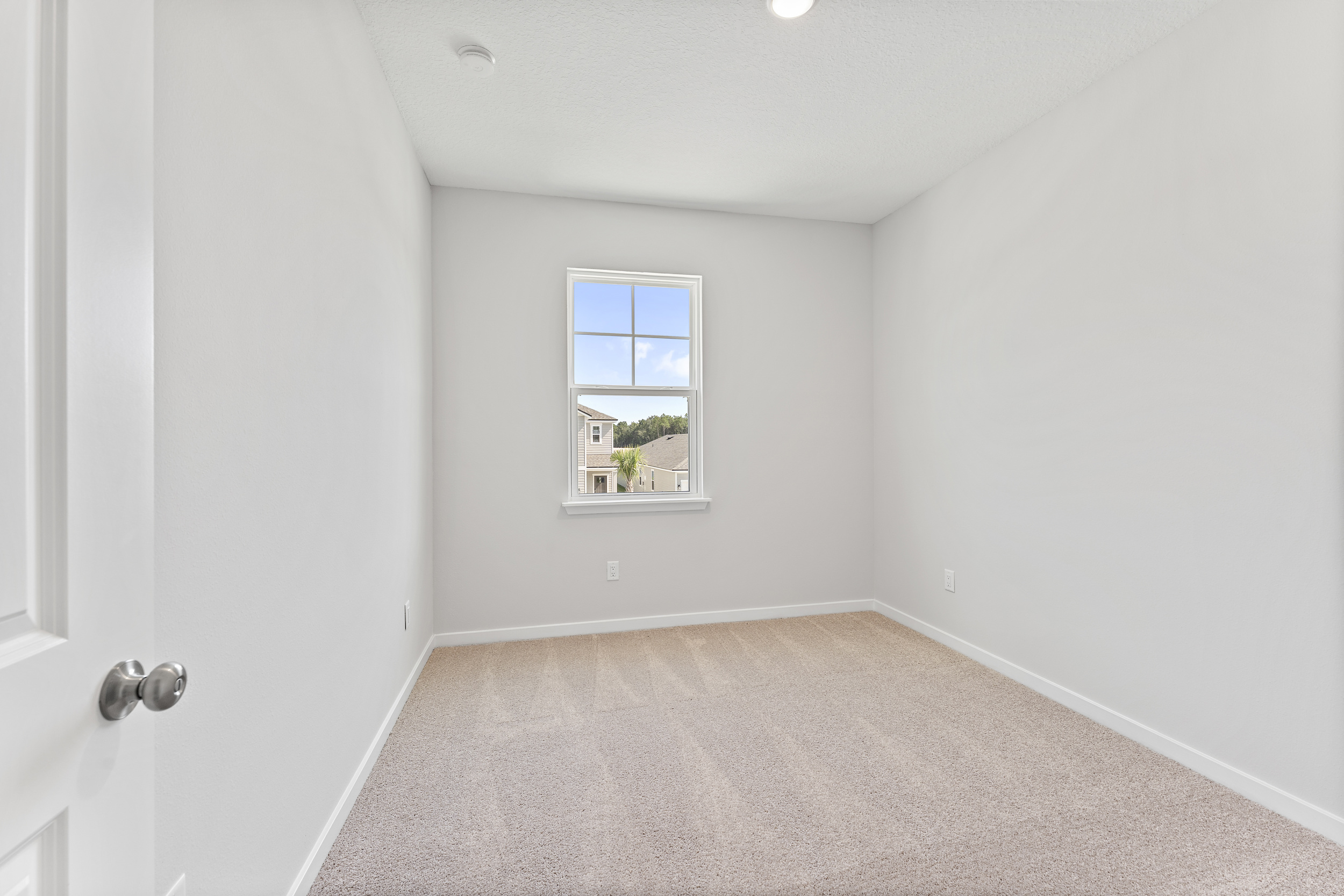 Lot 20 Ponderosa II Guest Bedroom with Window at Camden Woods in Kingsland, GA