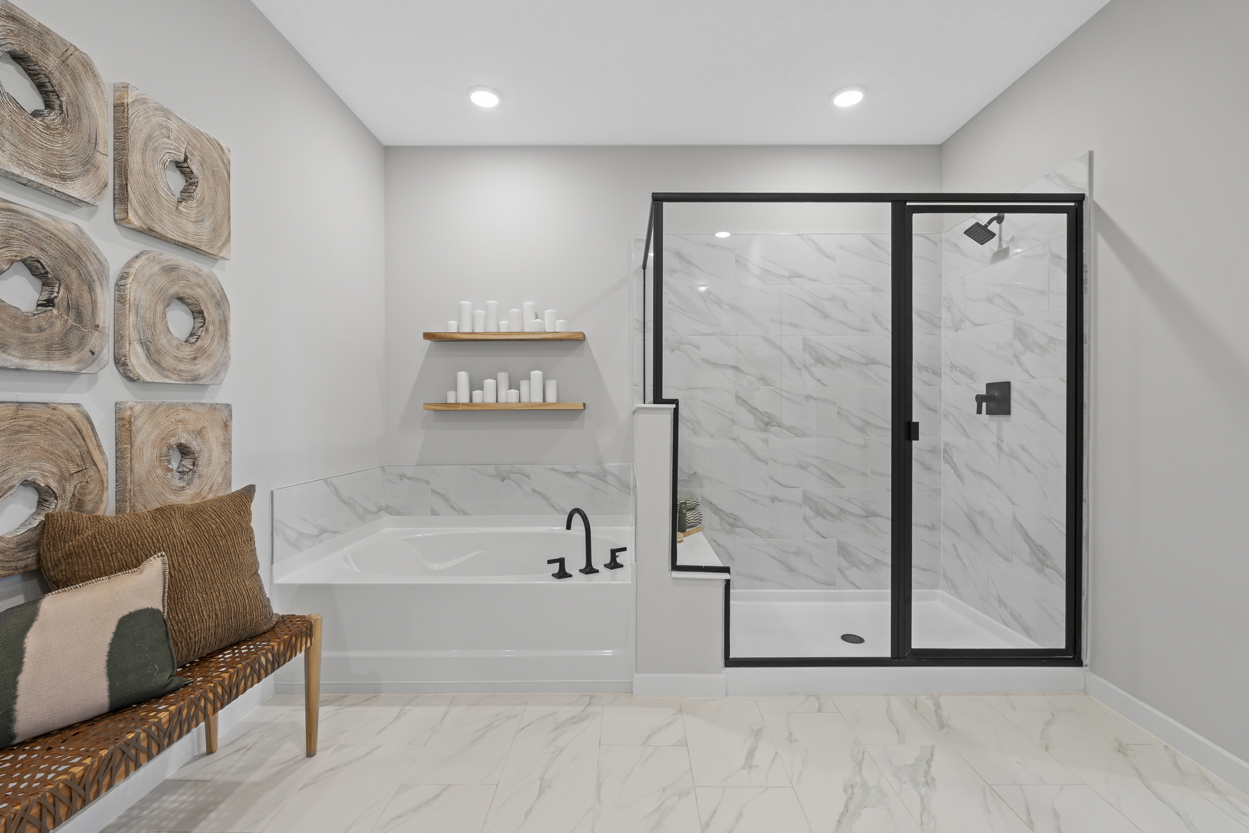 A bathroom with a large mirror.