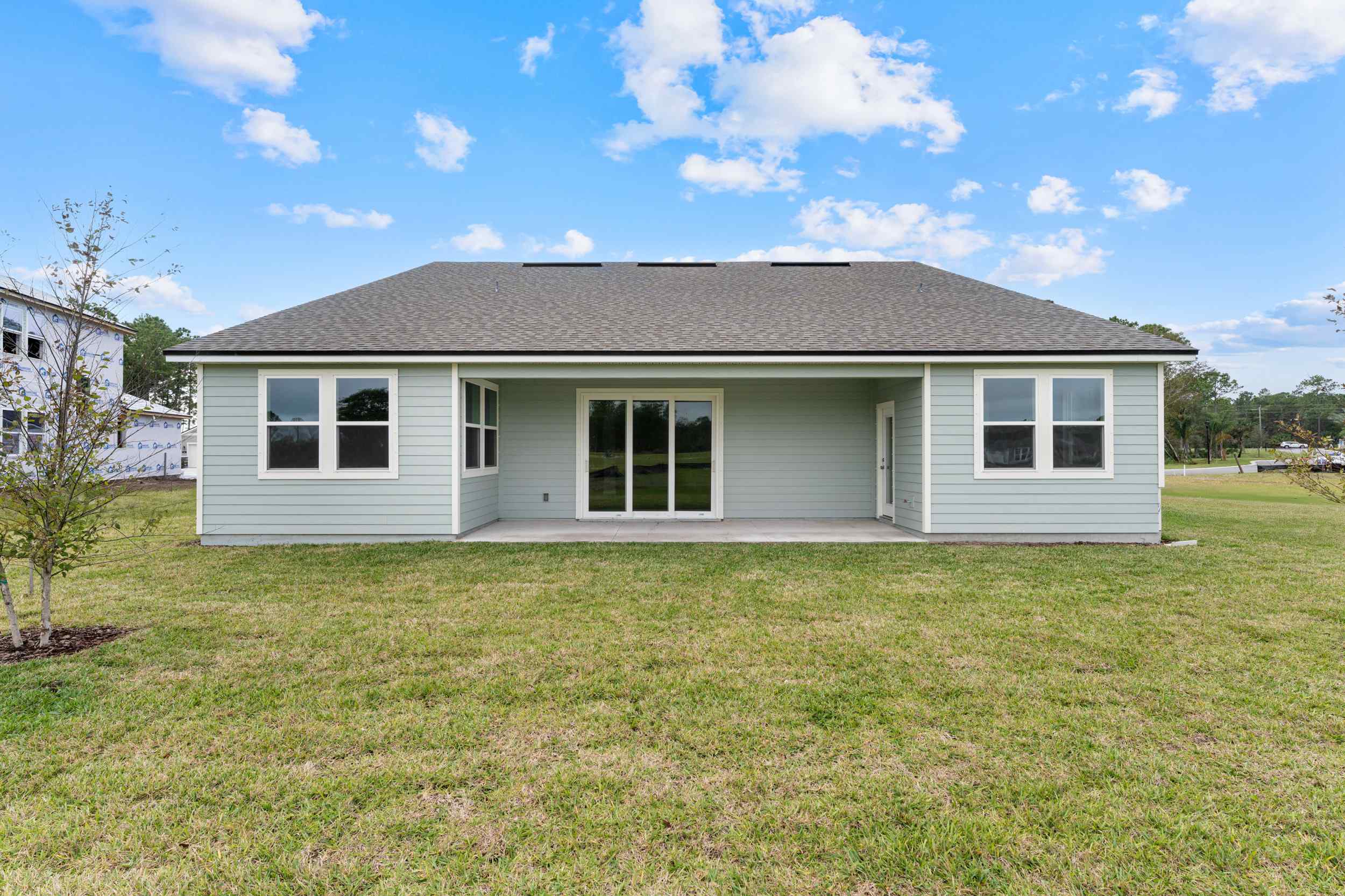 Lot 60 Rear Exterior with Covered Patio at Reserve East in Flagler Beach