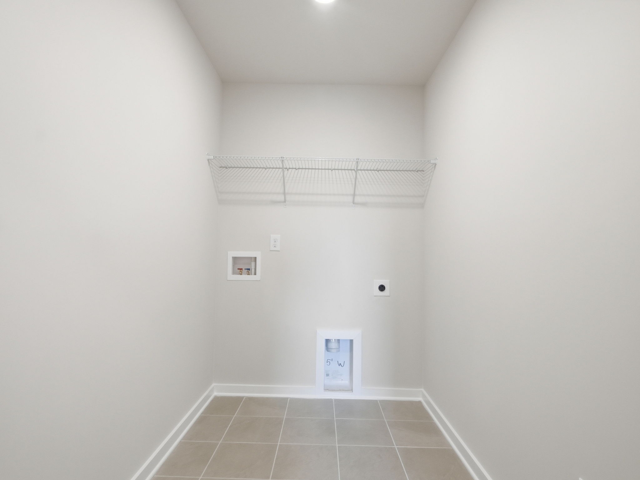 A white room with a vent.