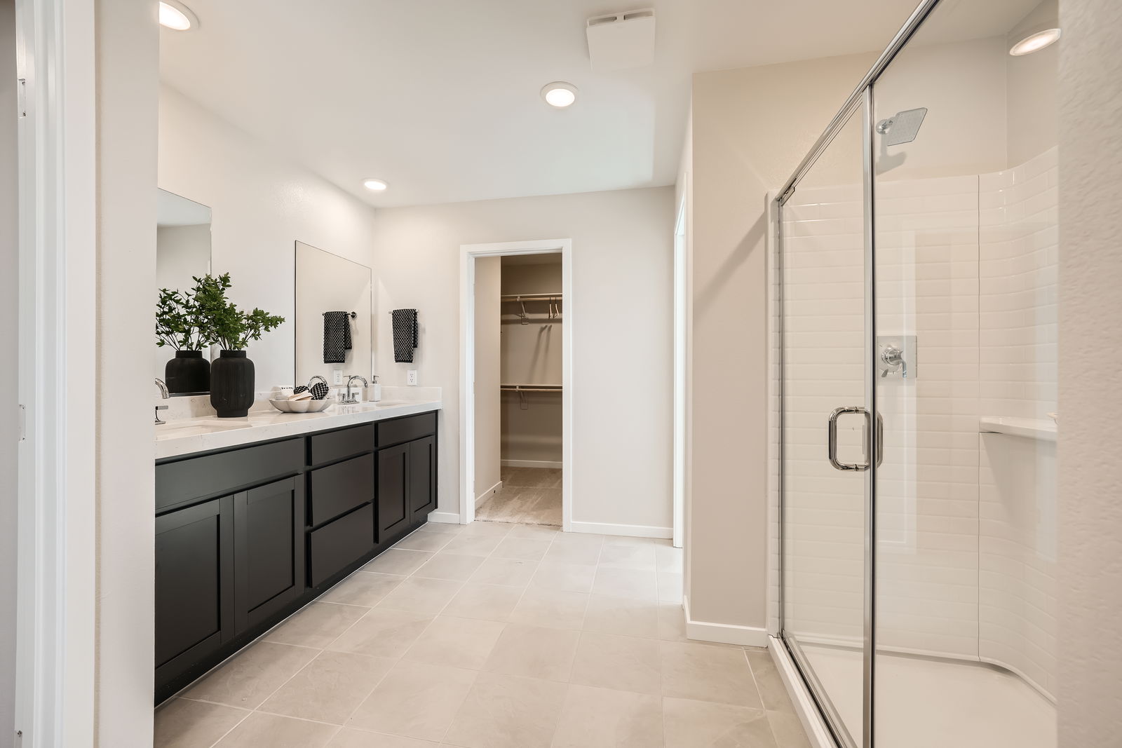 A bathroom with a glass shower.