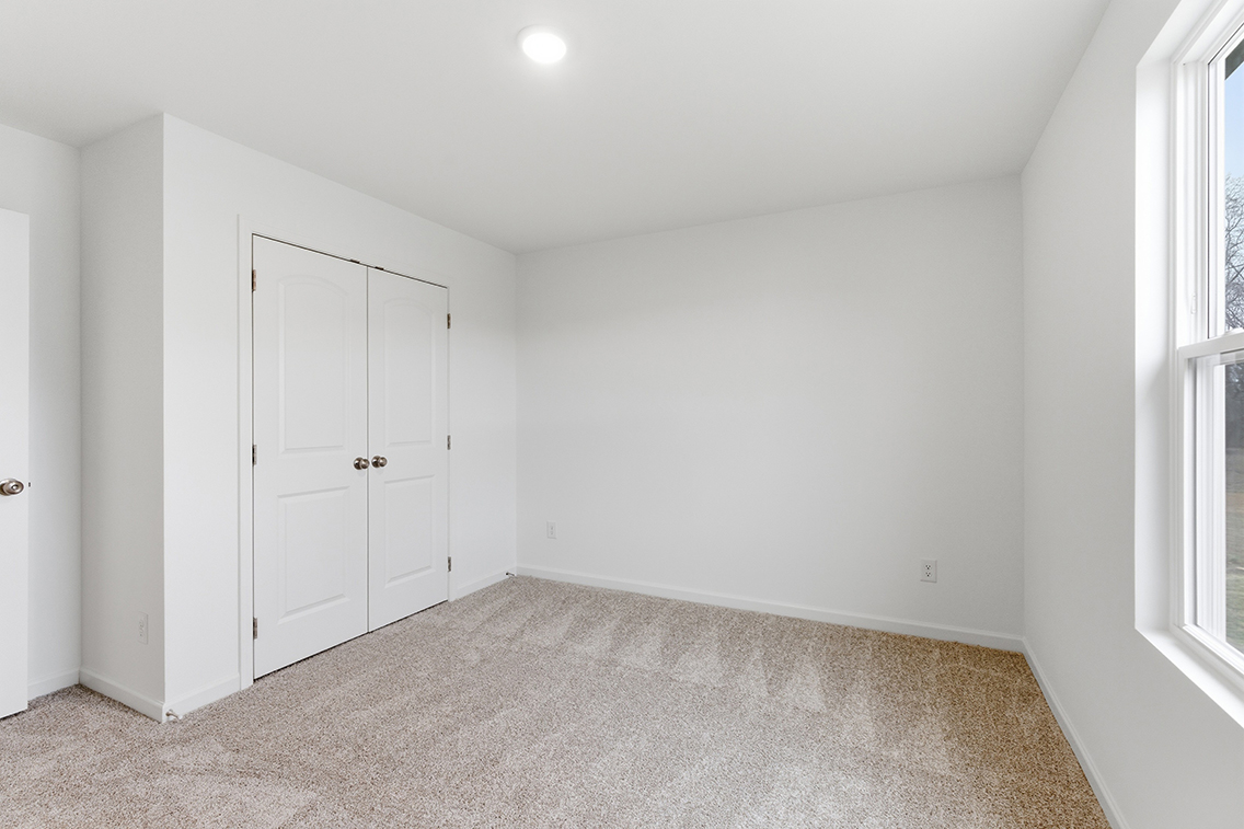 A room with white doors.