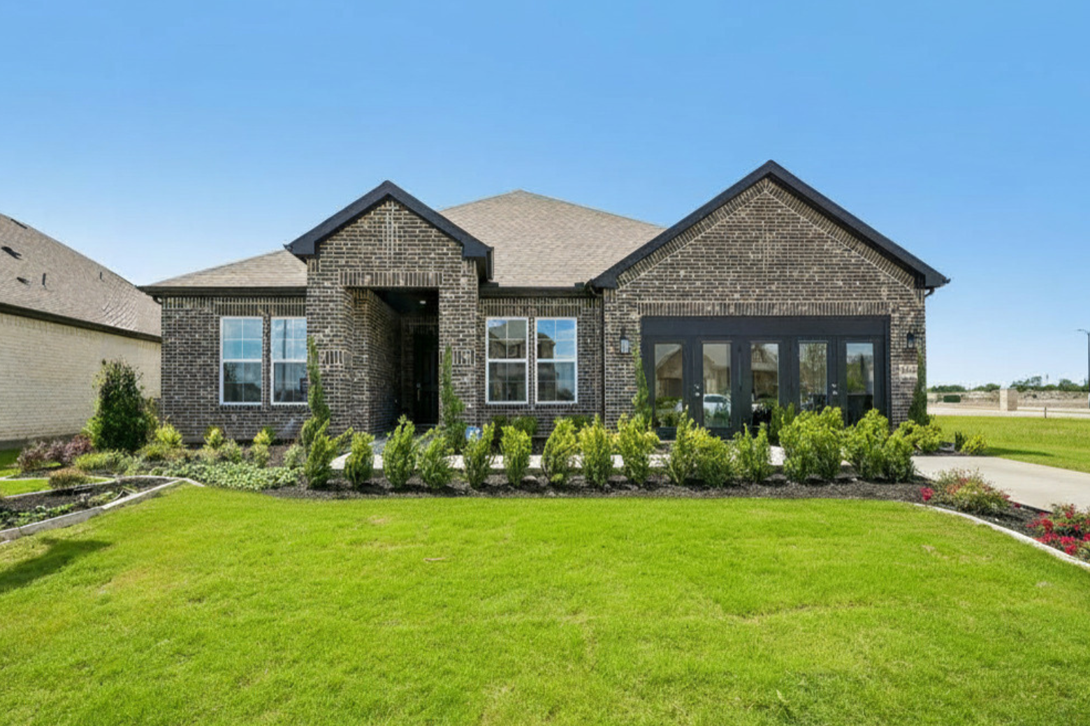 A house with a large front yard.