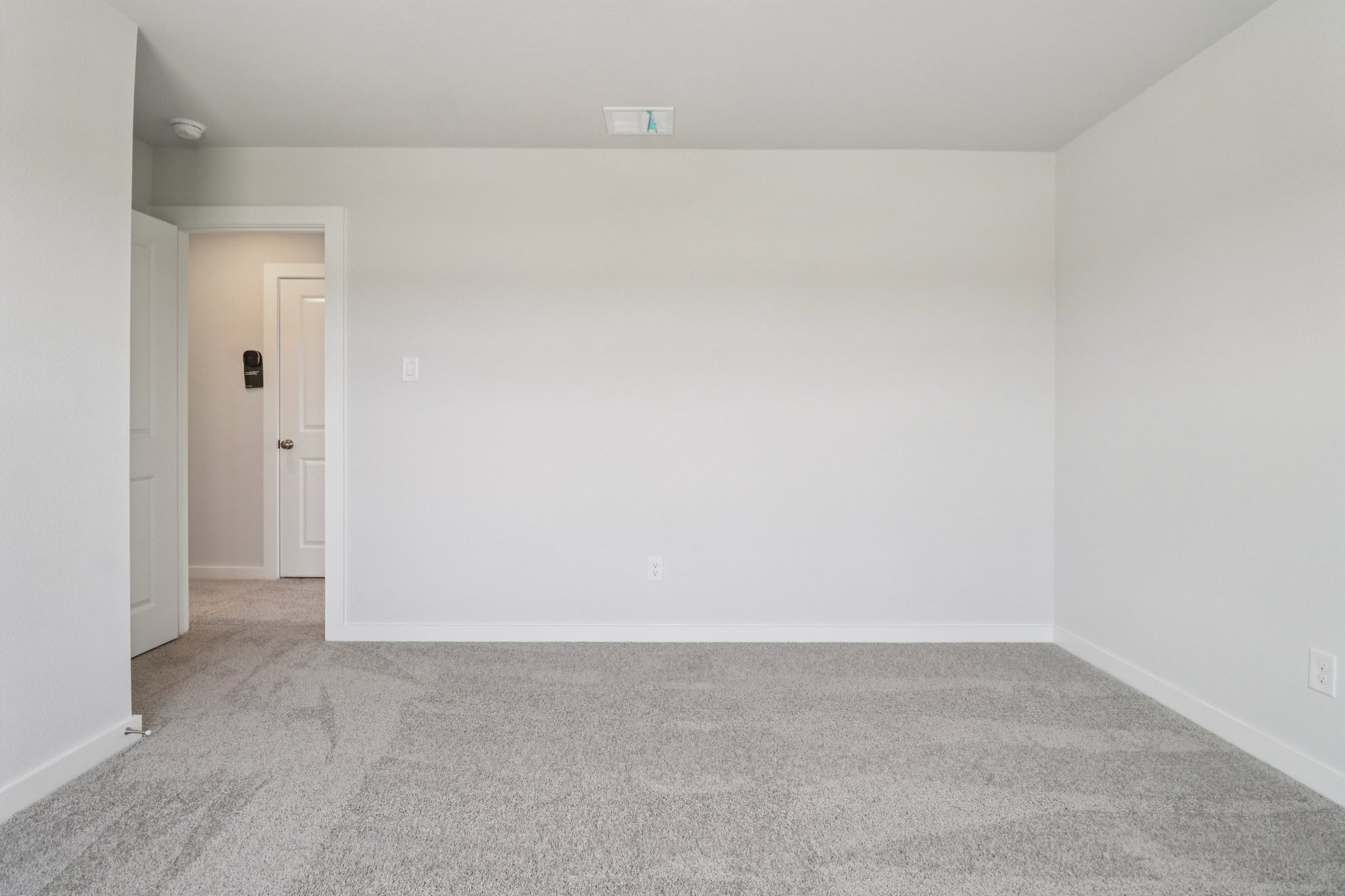 A room with white walls.