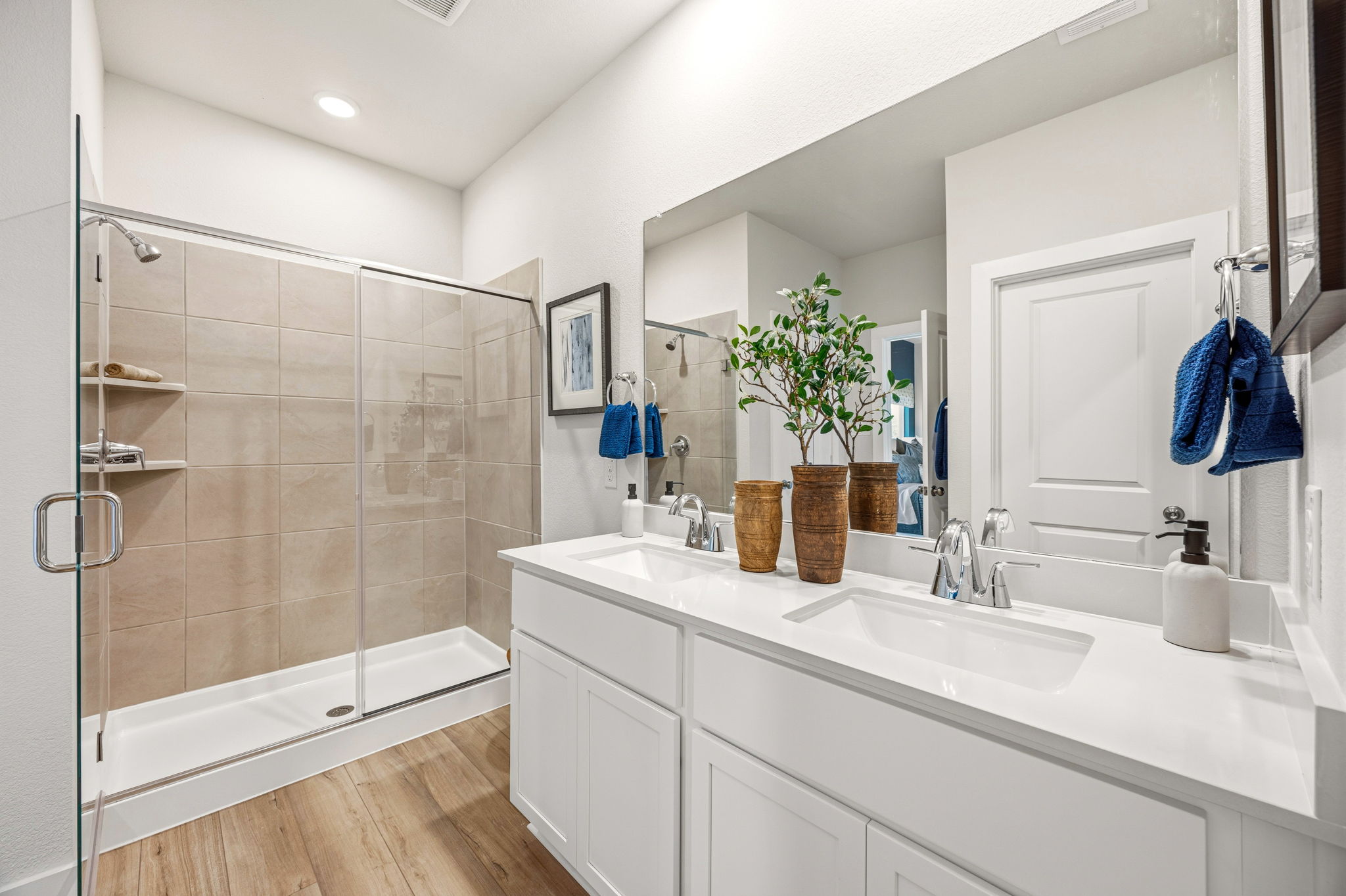 A bathroom with a glass shower.