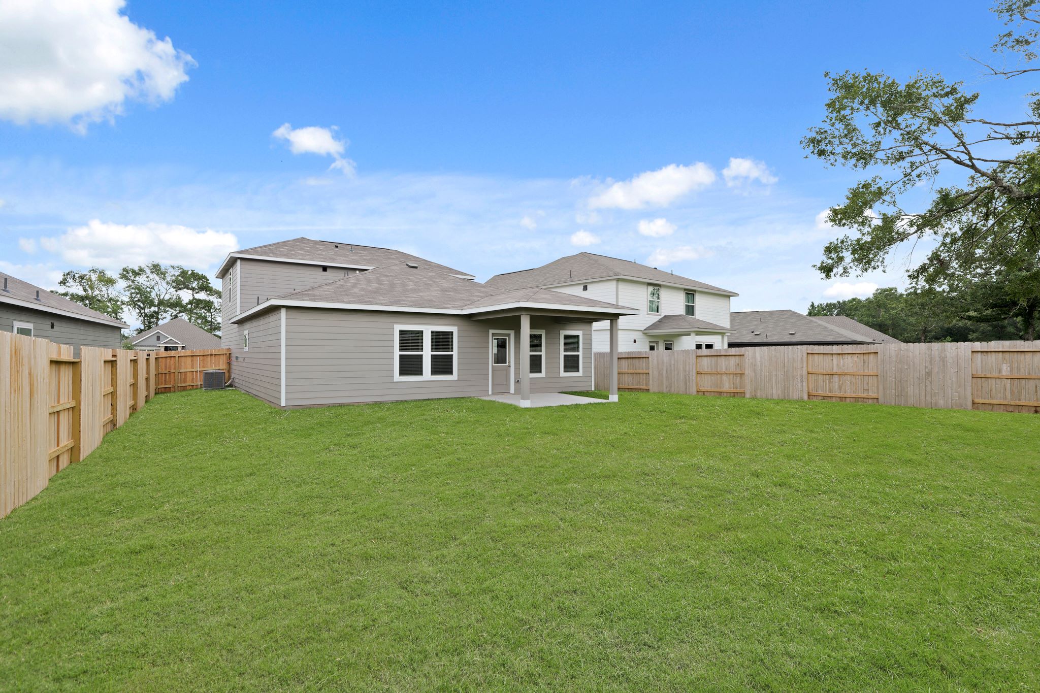 A house with a fence around it.