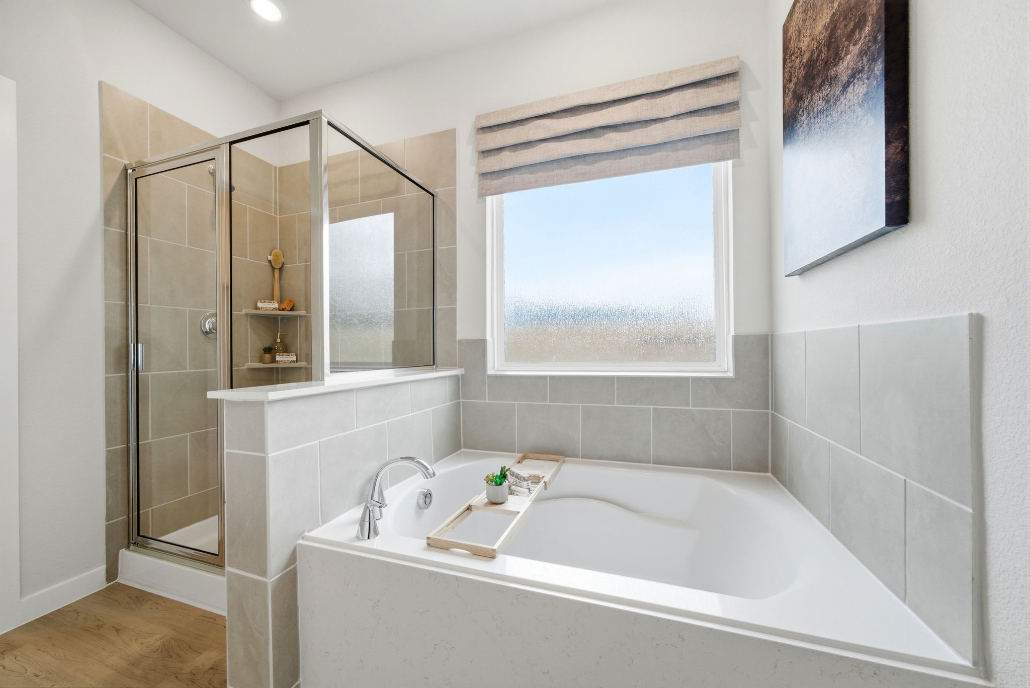 A bathroom with a tub and sink.