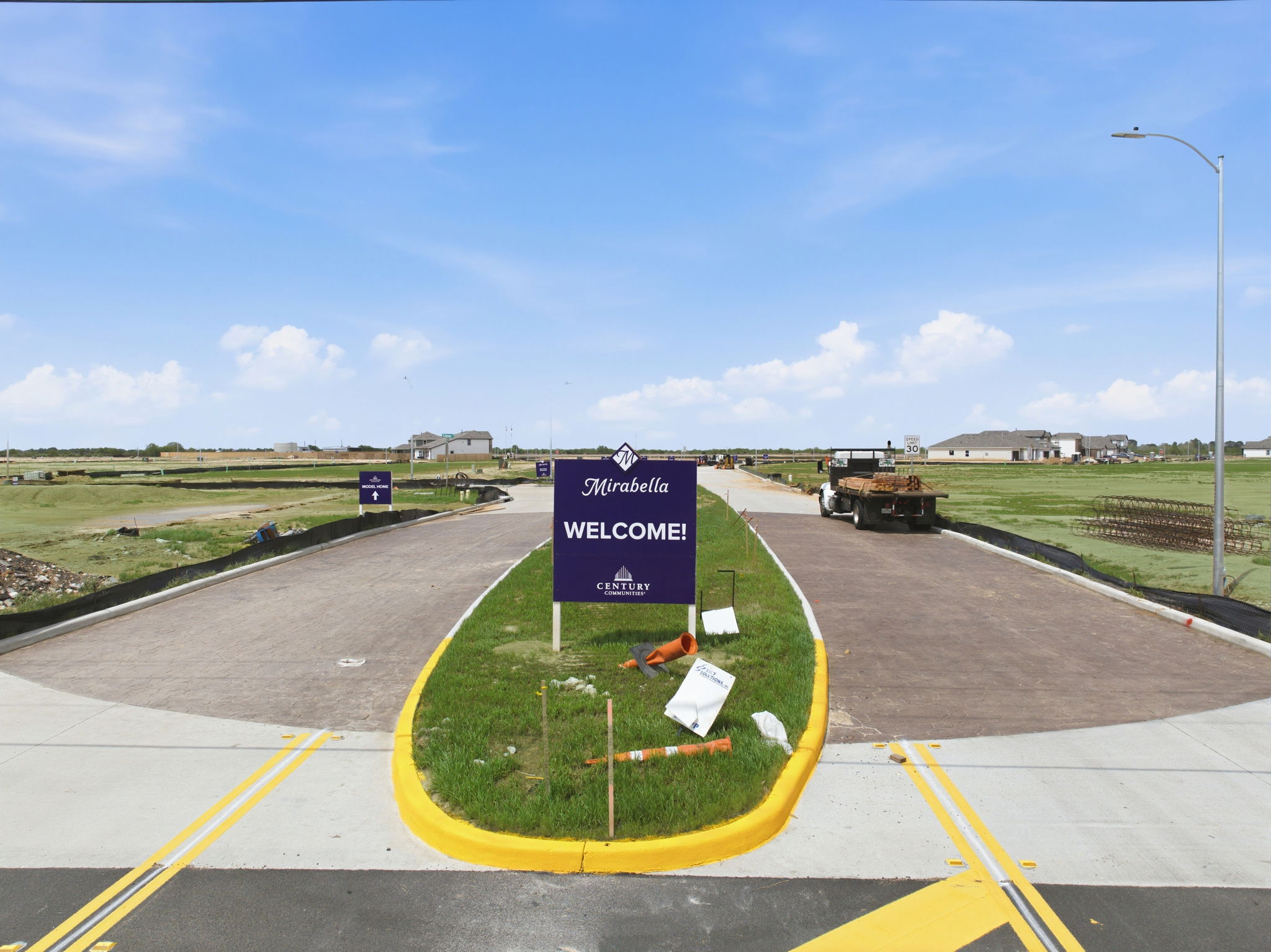 A road with a sign on it.