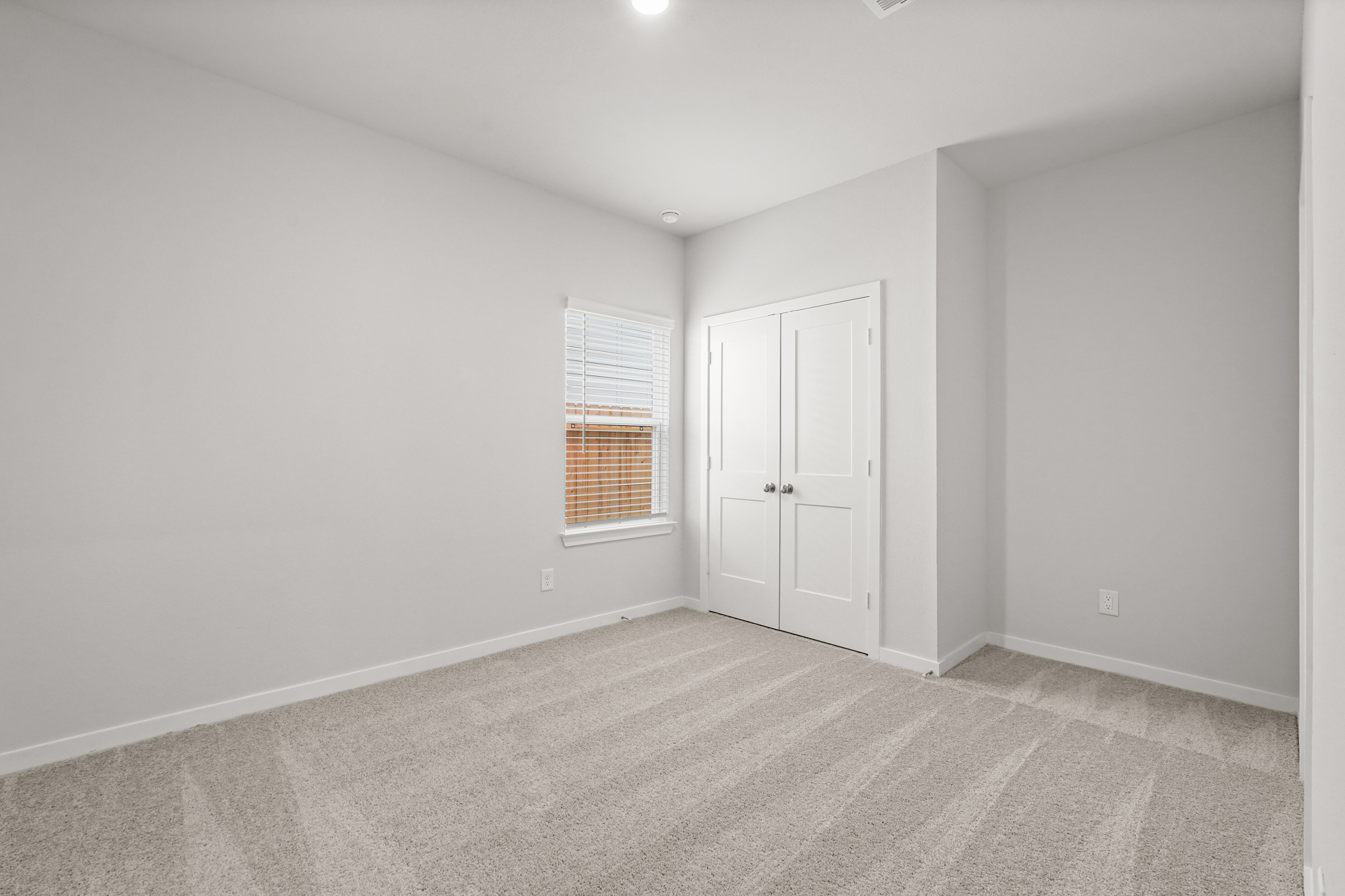A room with white doors.