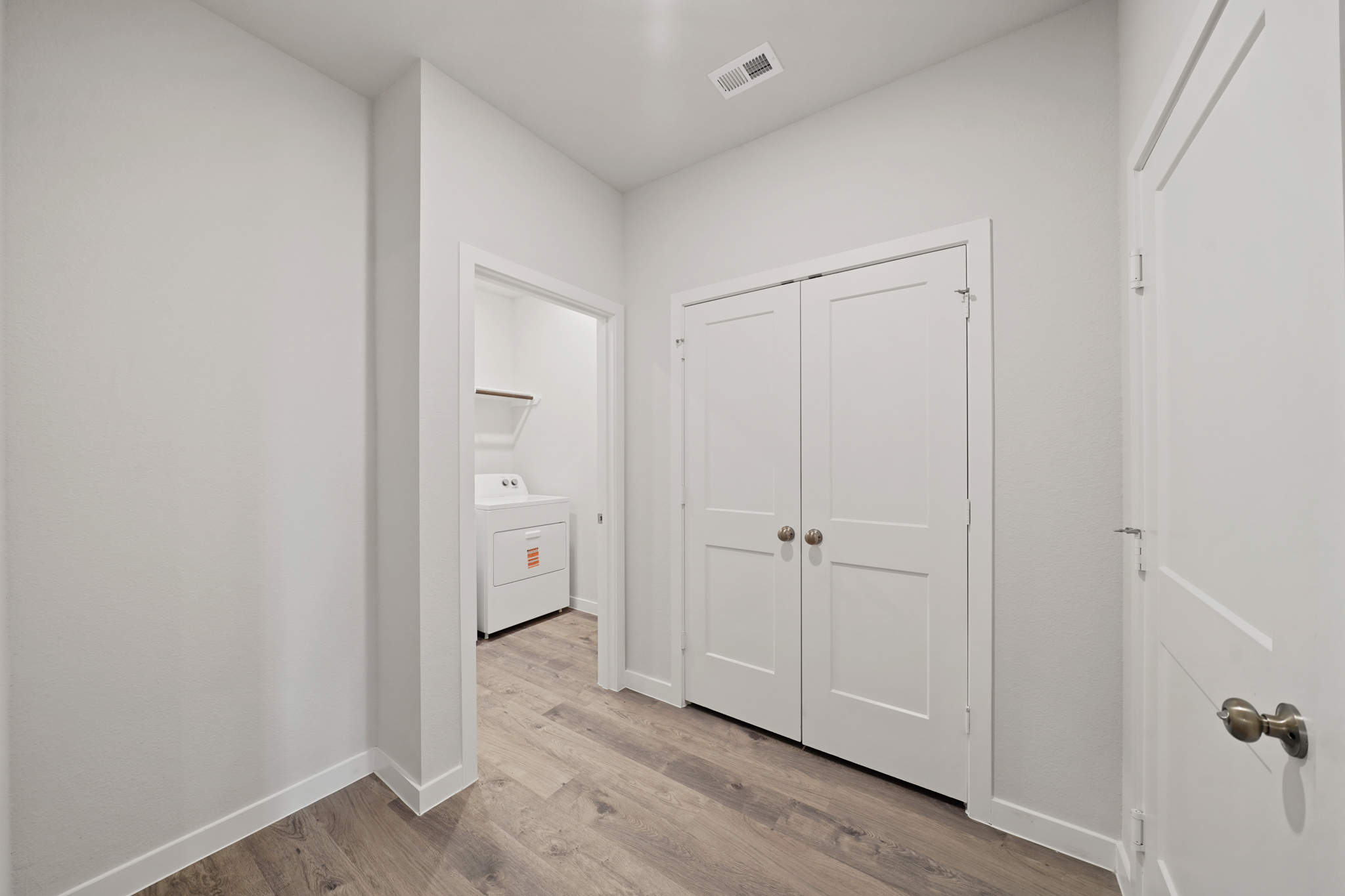 A room with white doors.