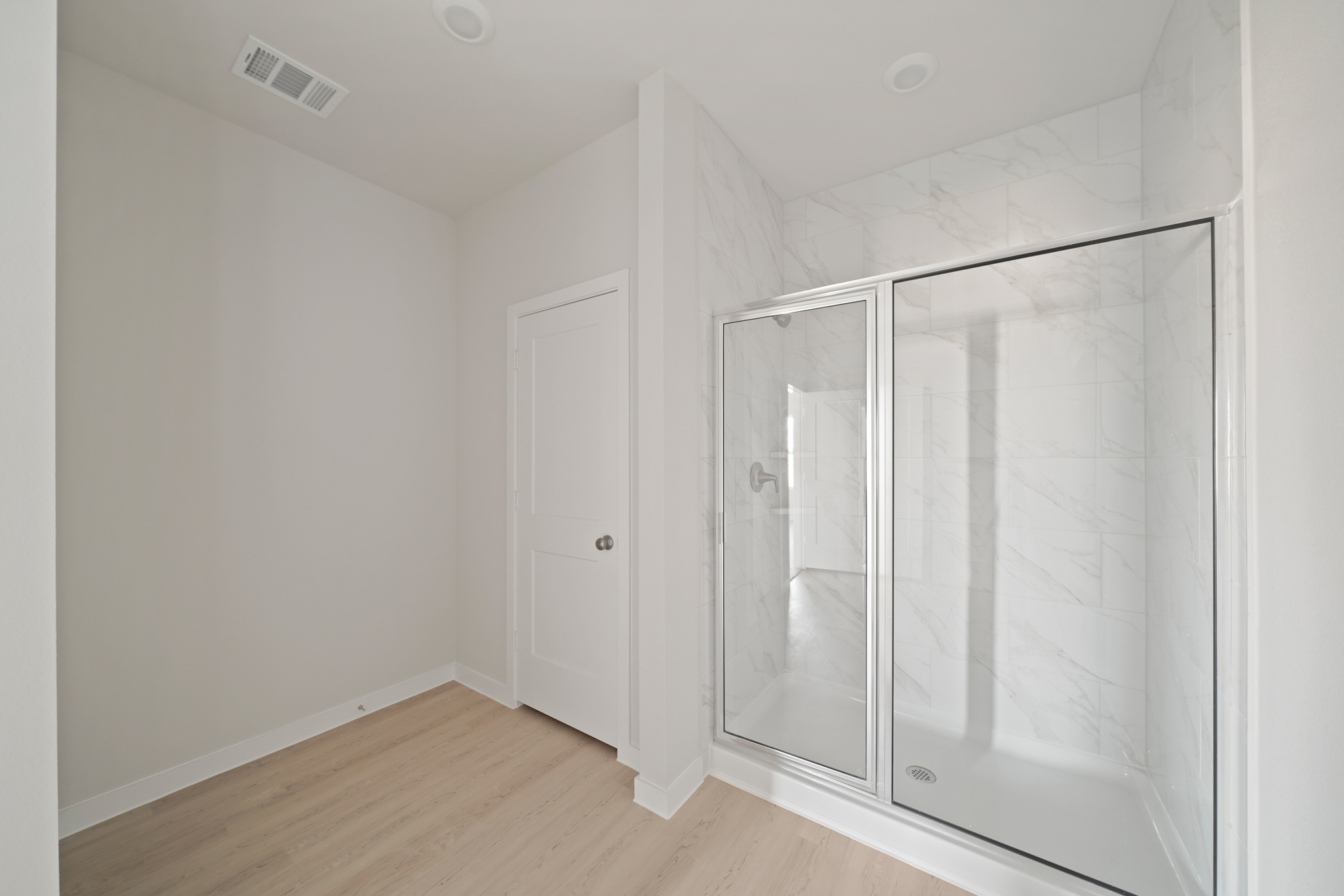 A room with white doors.