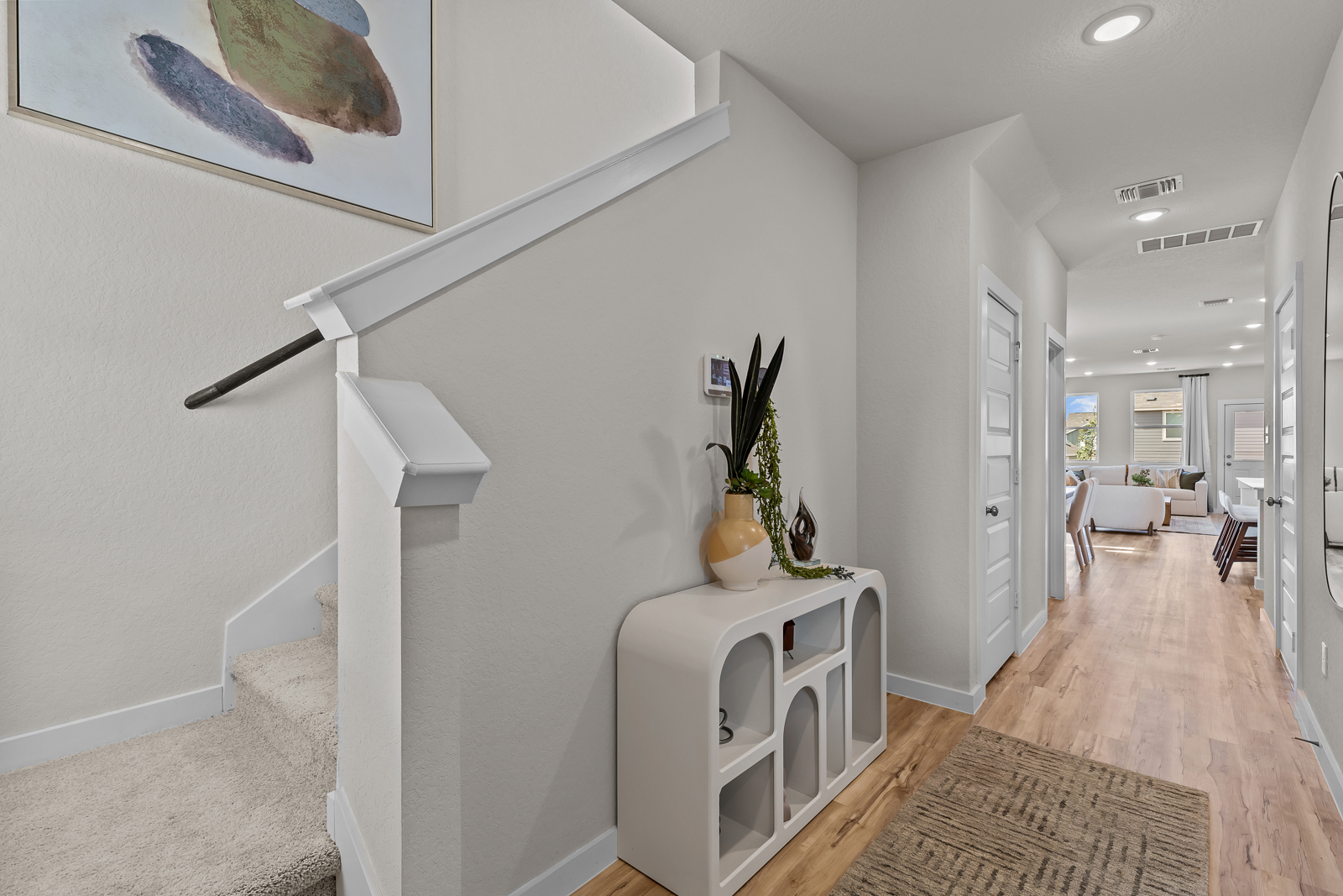 A white staircase in a house.