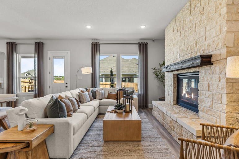 A living room with a fireplace.