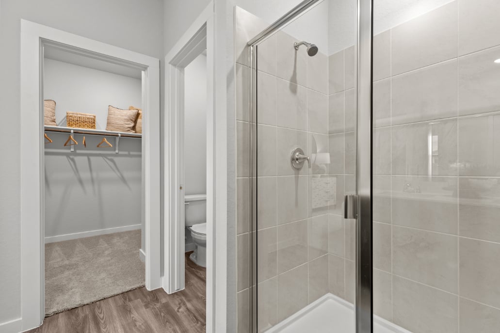 A bathroom with a glass shower.