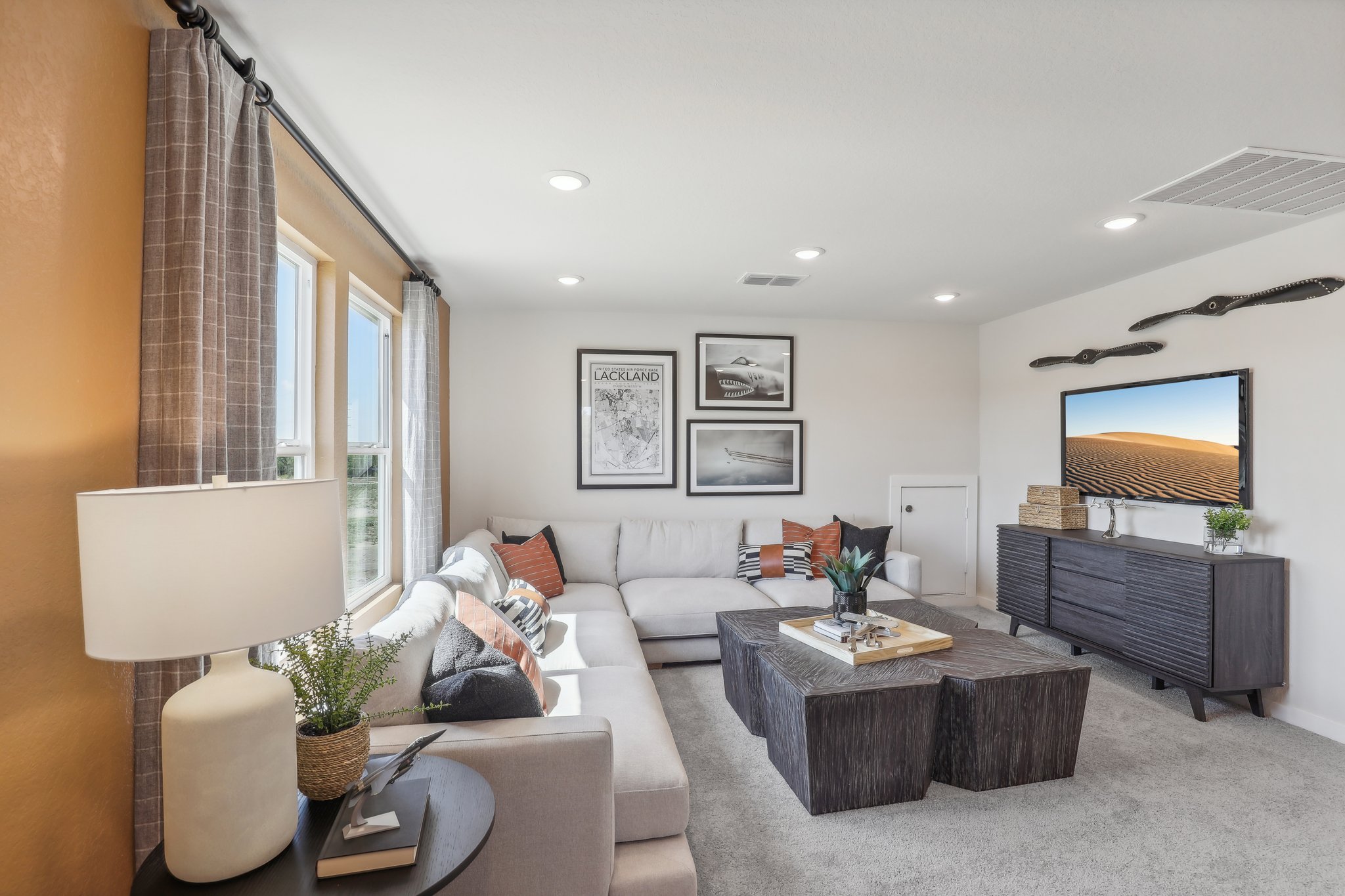 A living room with a couch and a coffee table.