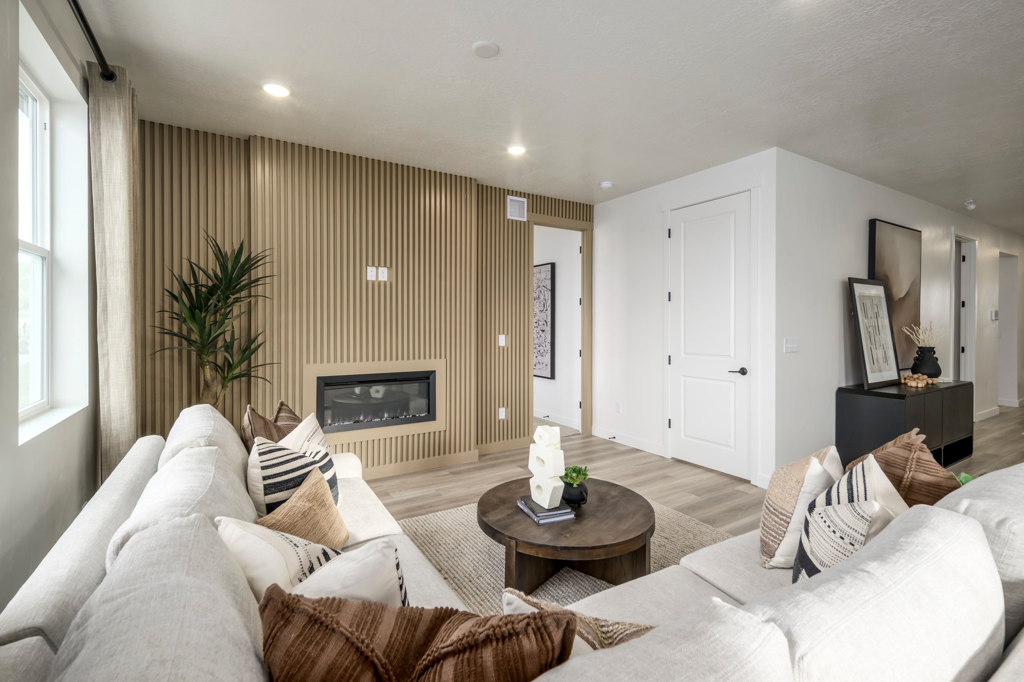 A living room with a fireplace.