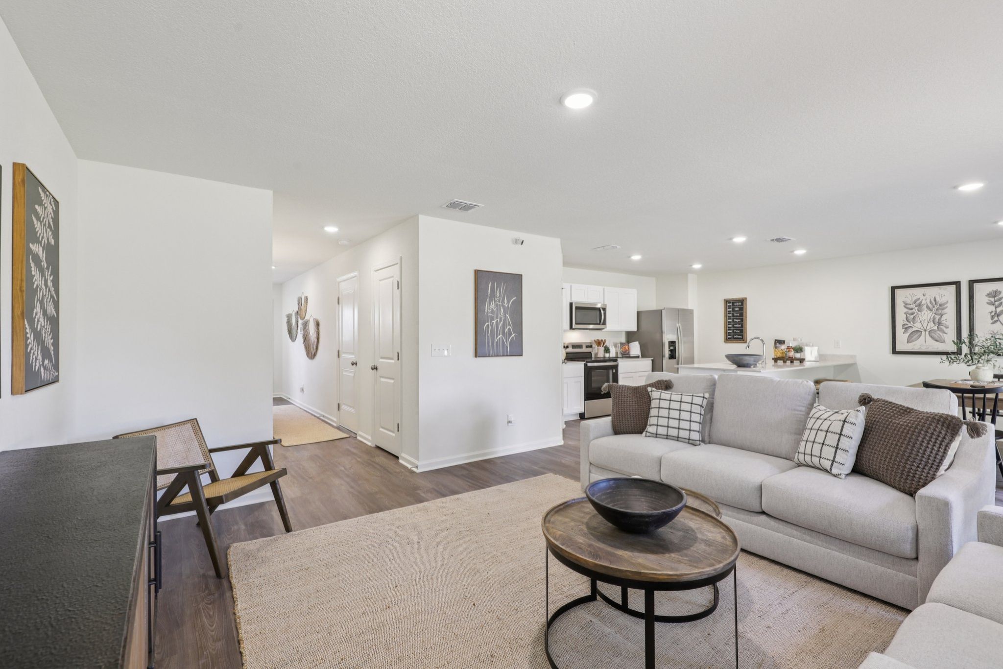 A living room with a couch and a table.