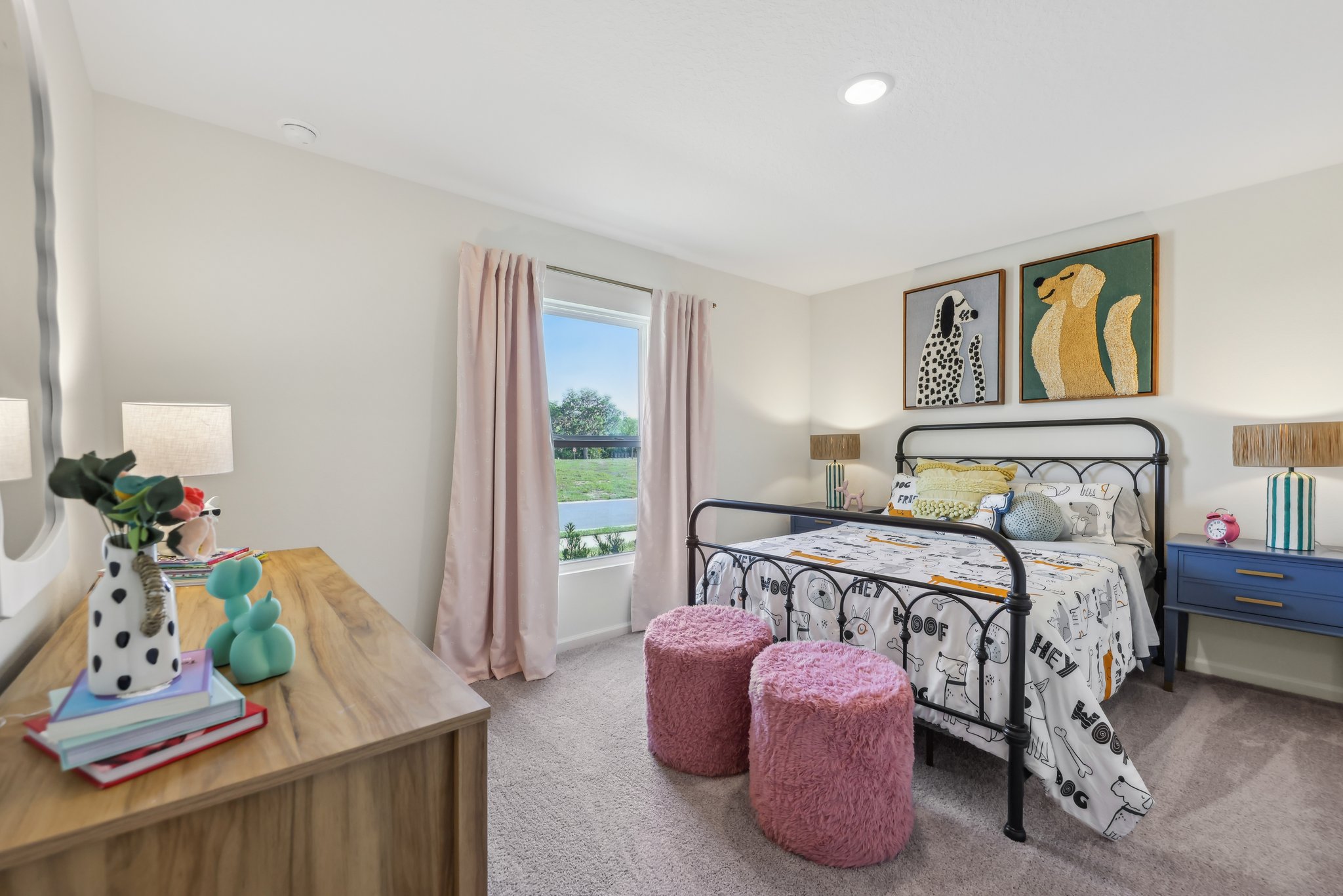 A bedroom with a bed and a desk.