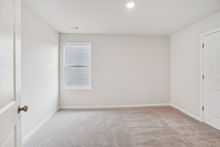 A room with white doors.